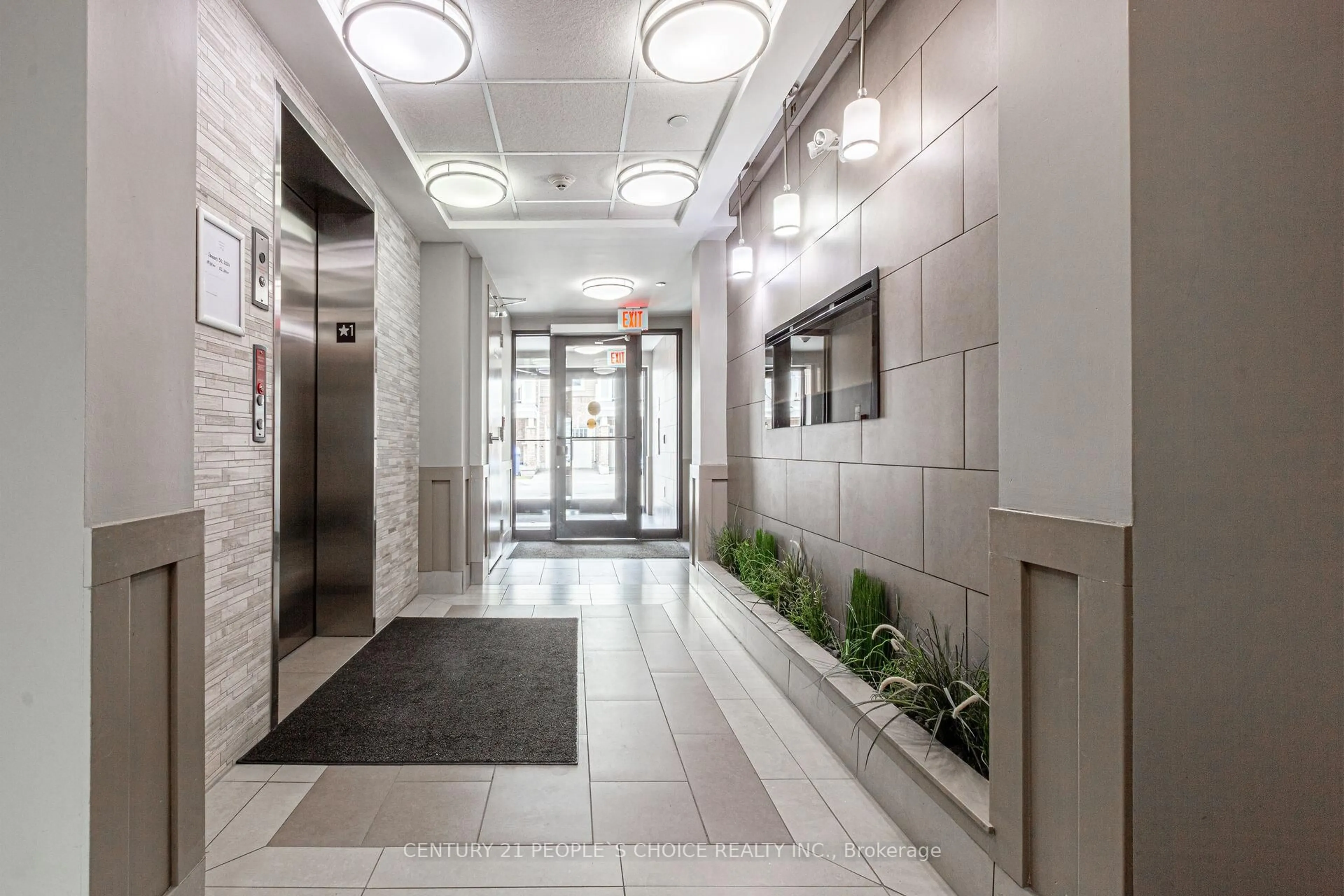 Indoor foyer for 1045 Nadalin Hts #211, Milton Ontario L9T 8R5