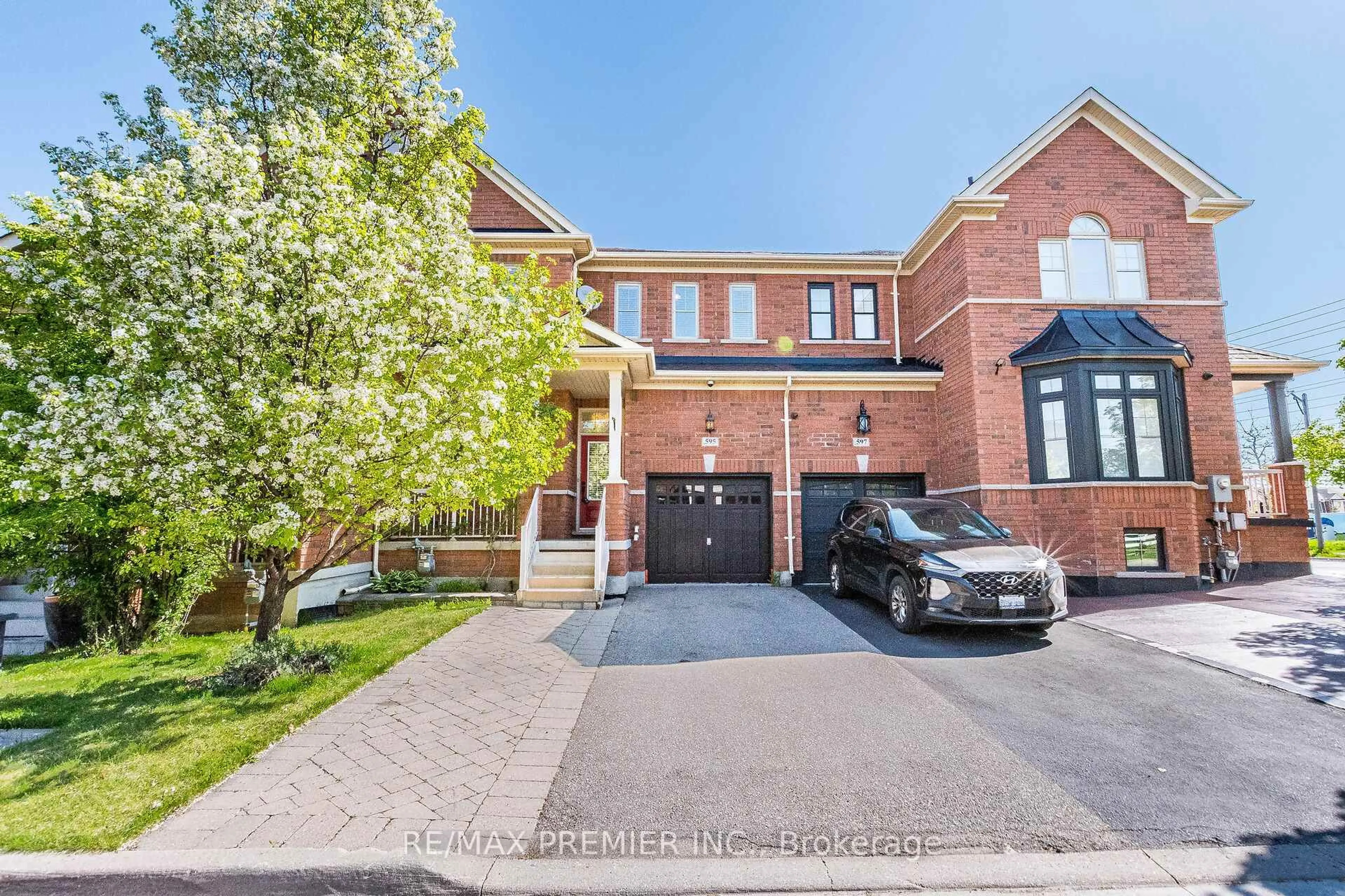 Home with brick exterior material, street for 595 Grant Way, Milton Ontario L9T 0W1