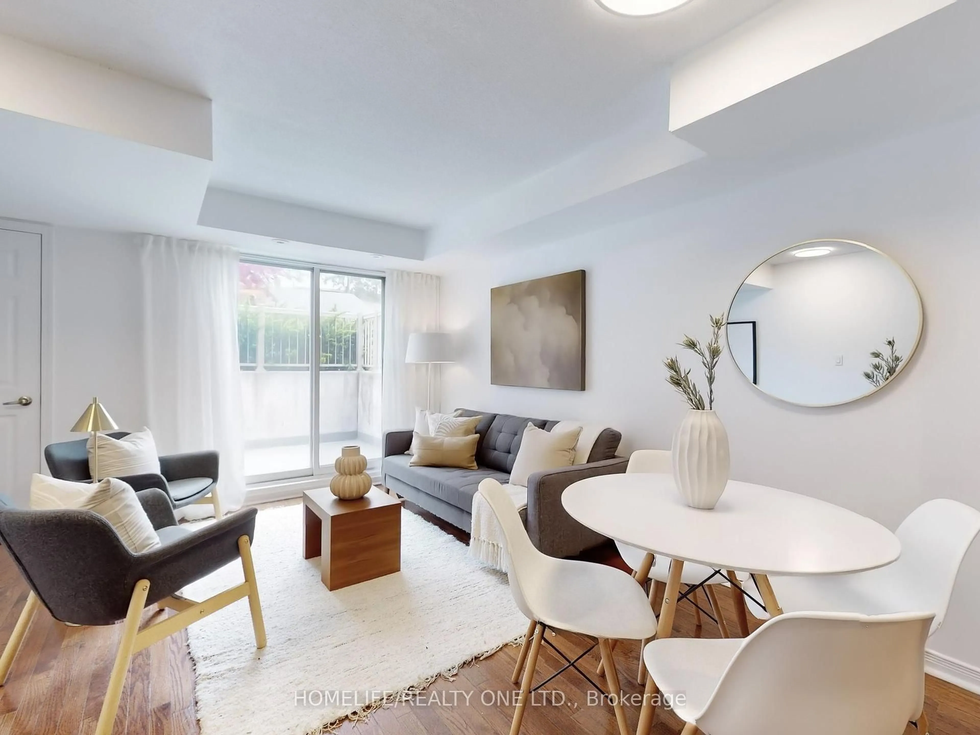 Living room with furniture, unknown for 25 Elsie Lane #TH145, Toronto Ontario M6P 3N3