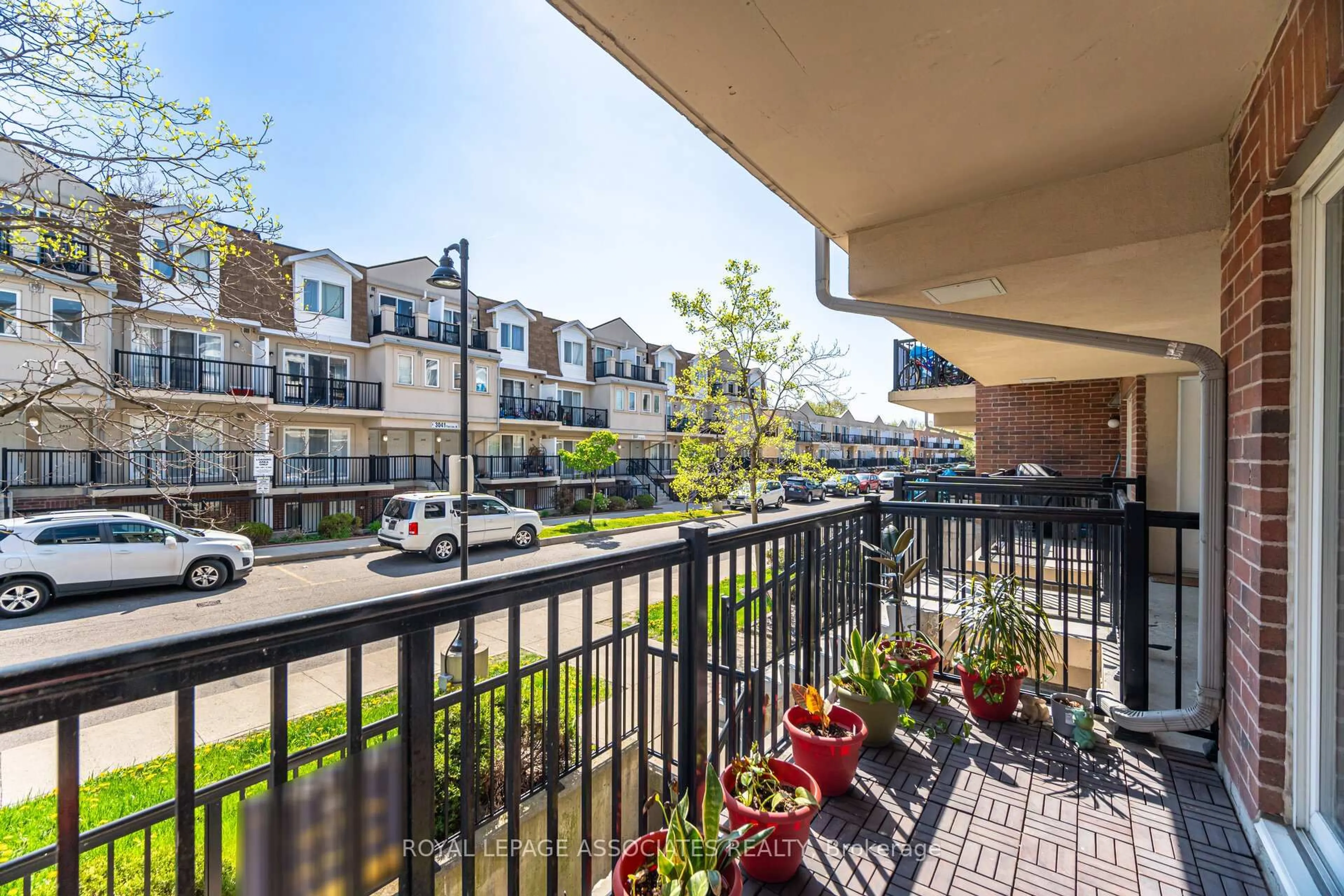 Patio, city buildings view from balcony for 3043 Finch Ave #2042, Toronto Ontario M9M 0A4
