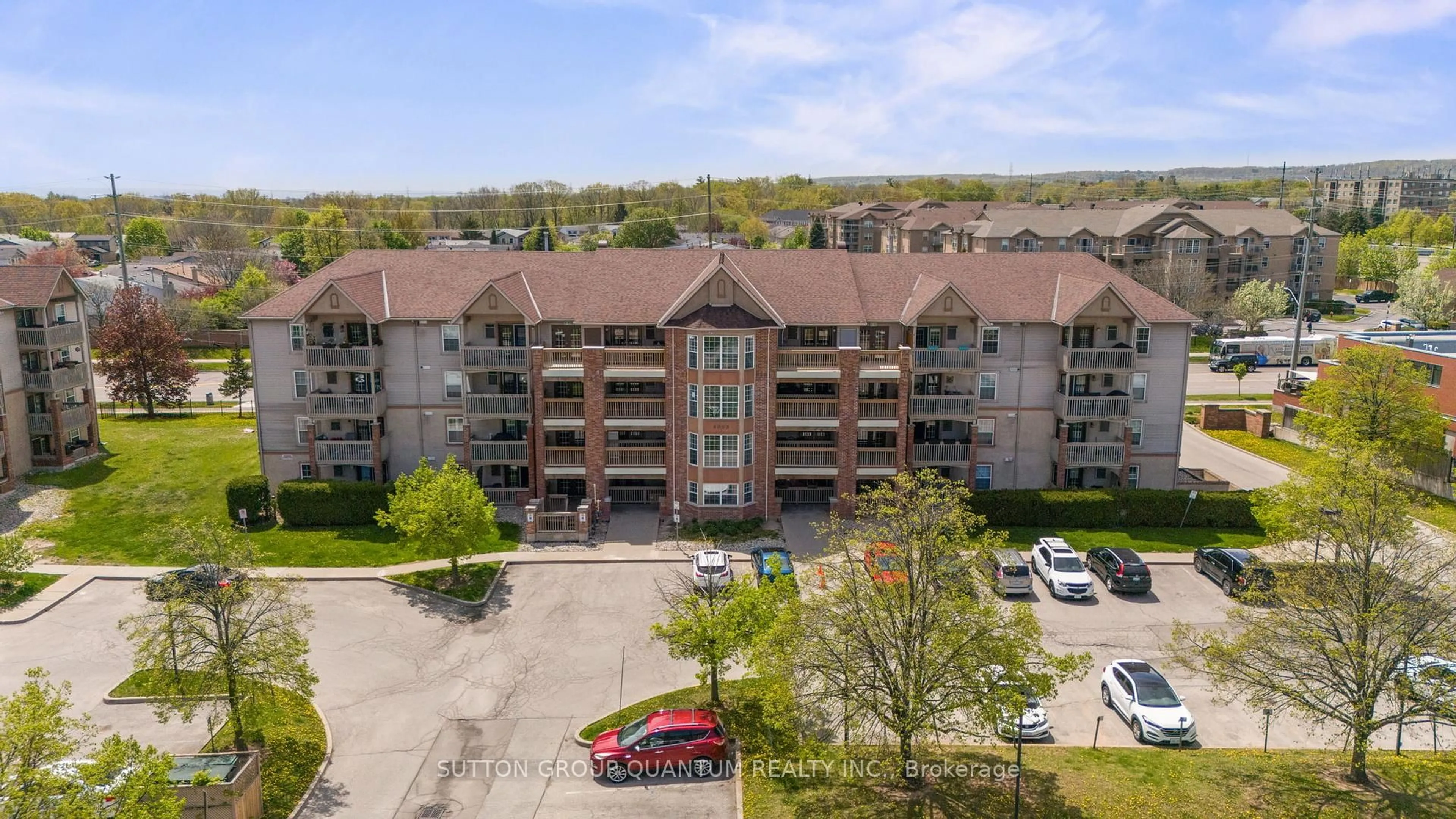 A pic from outside/outdoor area/front of a property/back of a property/a pic from drone, unknown for 4003 Kilmer Dr #305, Burlington Ontario L7M 4M1