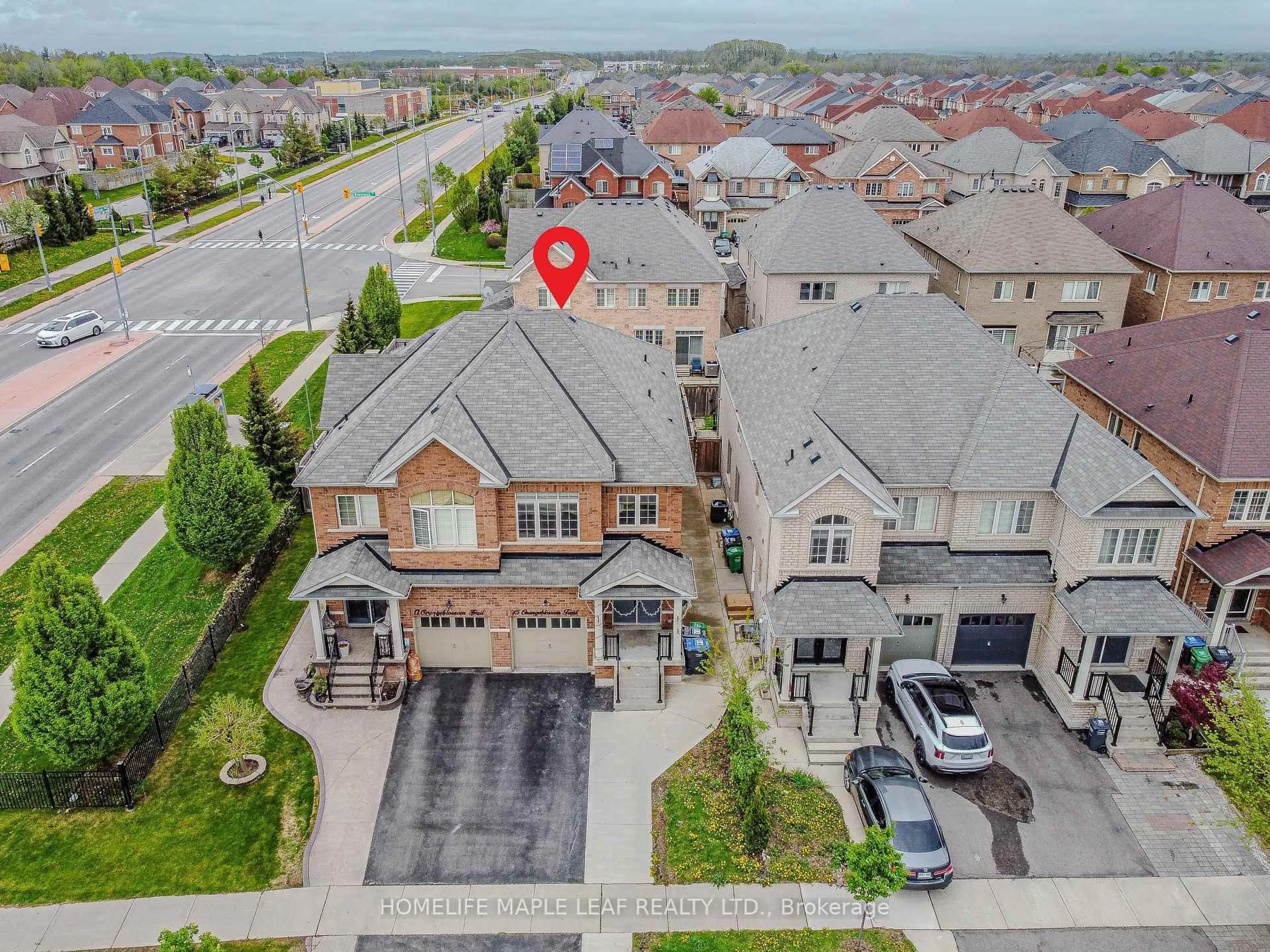 A pic from outside/outdoor area/front of a property/back of a property/a pic from drone, street for 15 Orangeblossom Tr, Brampton Ontario L6X 3B4