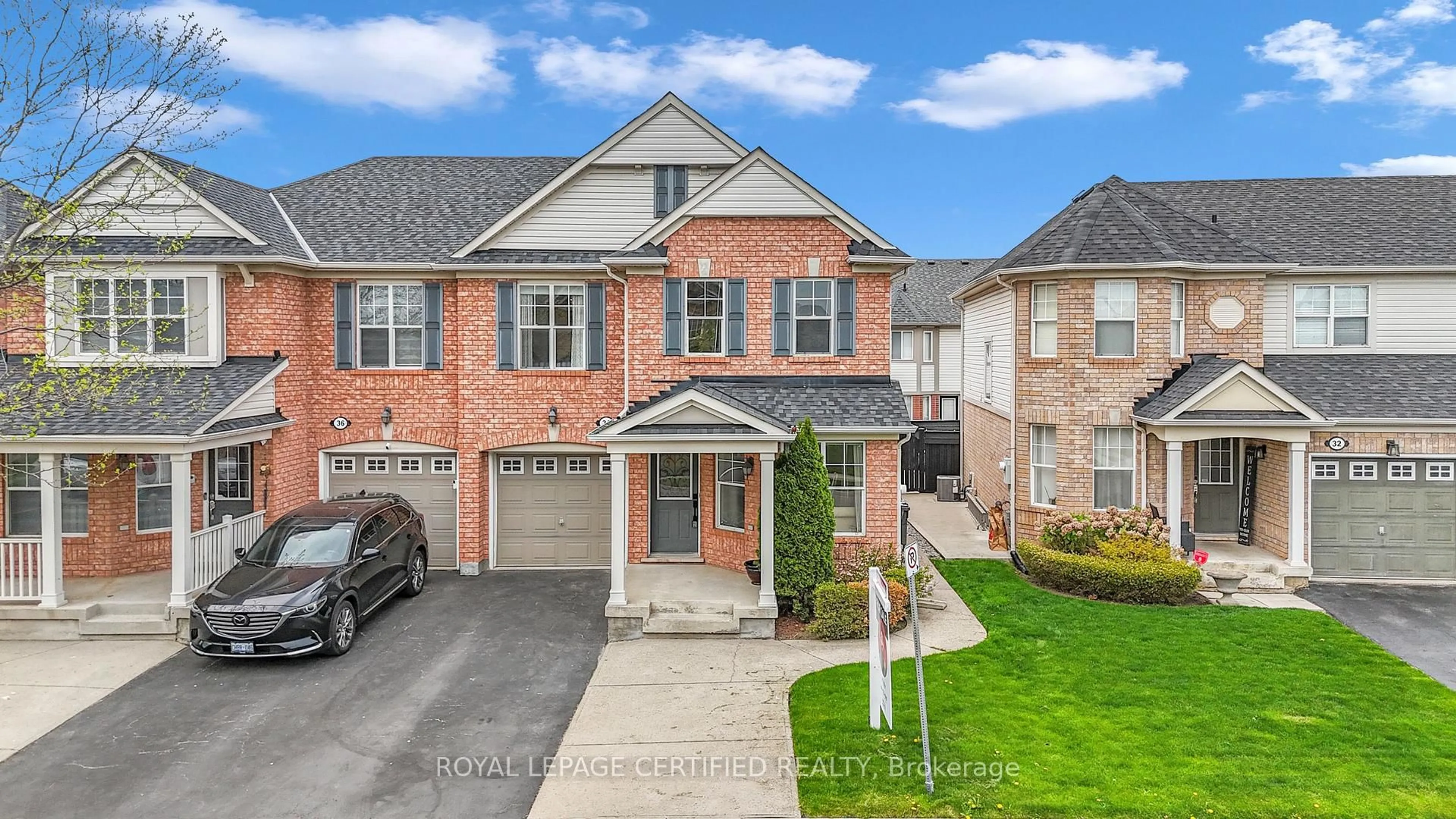Home with brick exterior material, street for 34 Tawnie Cres, Brampton Ontario L6X 0L7