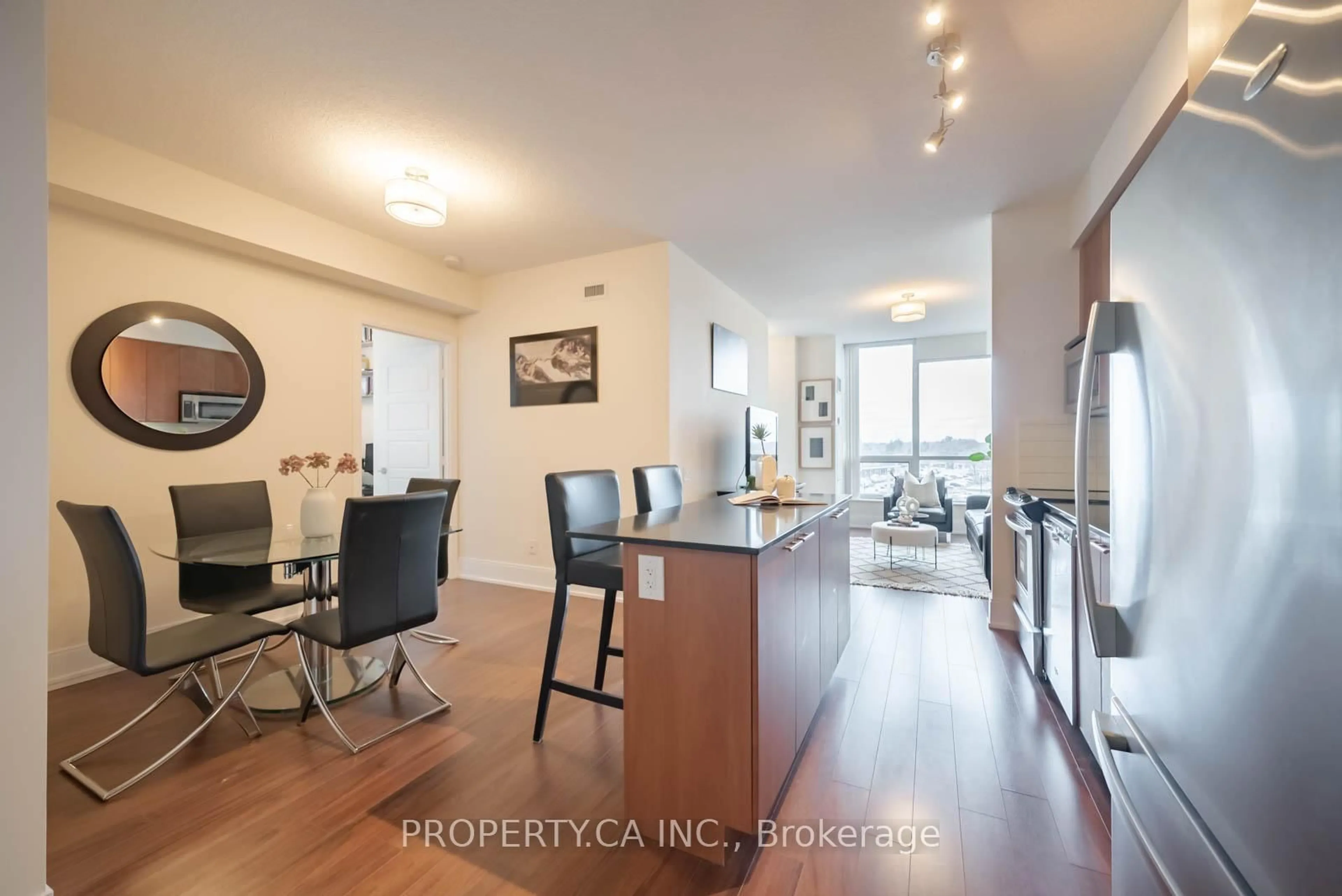 Open concept kitchen, wood/laminate floor for 15 Viking Lane #704, Toronto Ontario M9B 0A4