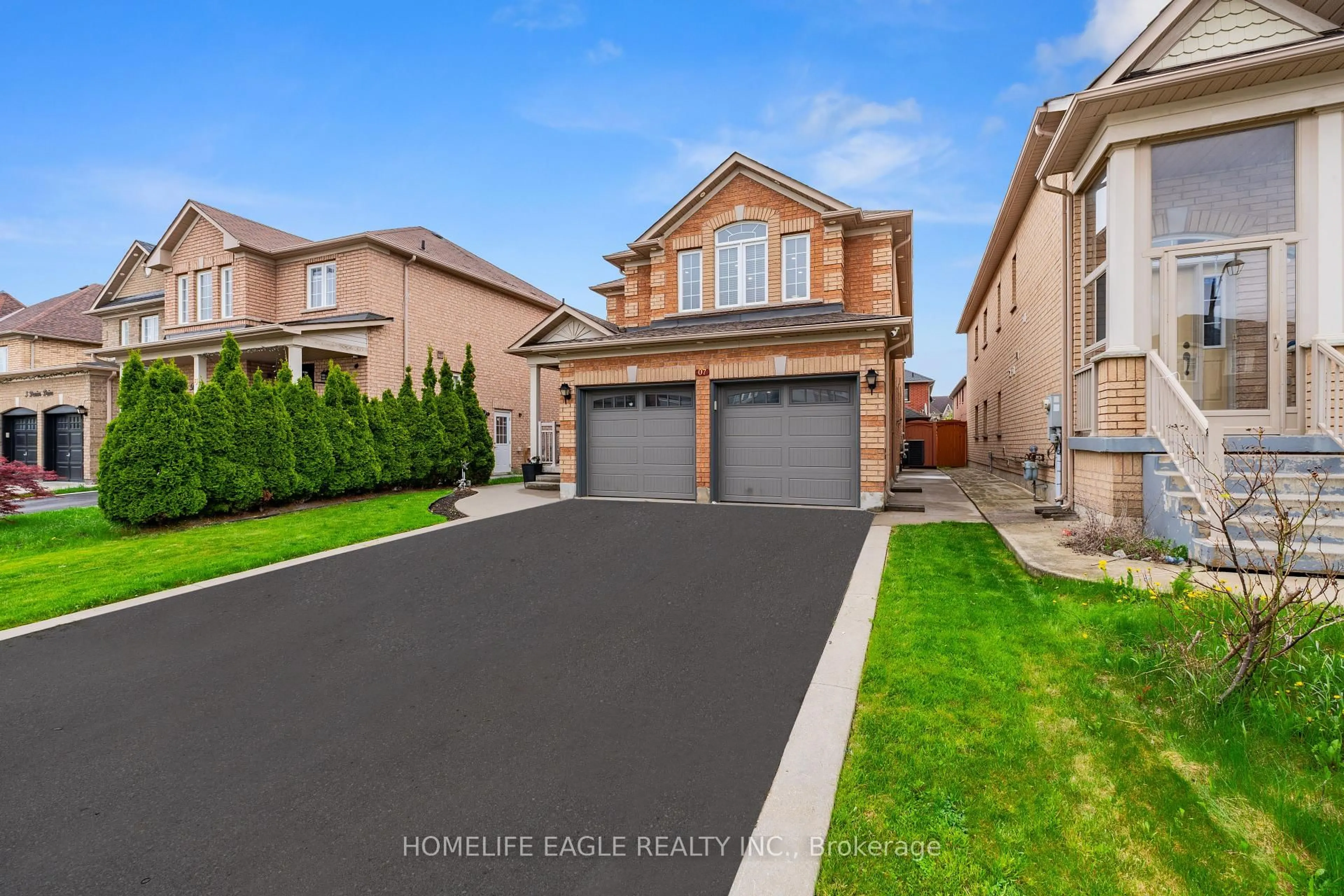 Home with vinyl exterior material, street for 7 Denim Dr, Brampton Ontario L6P 1K4