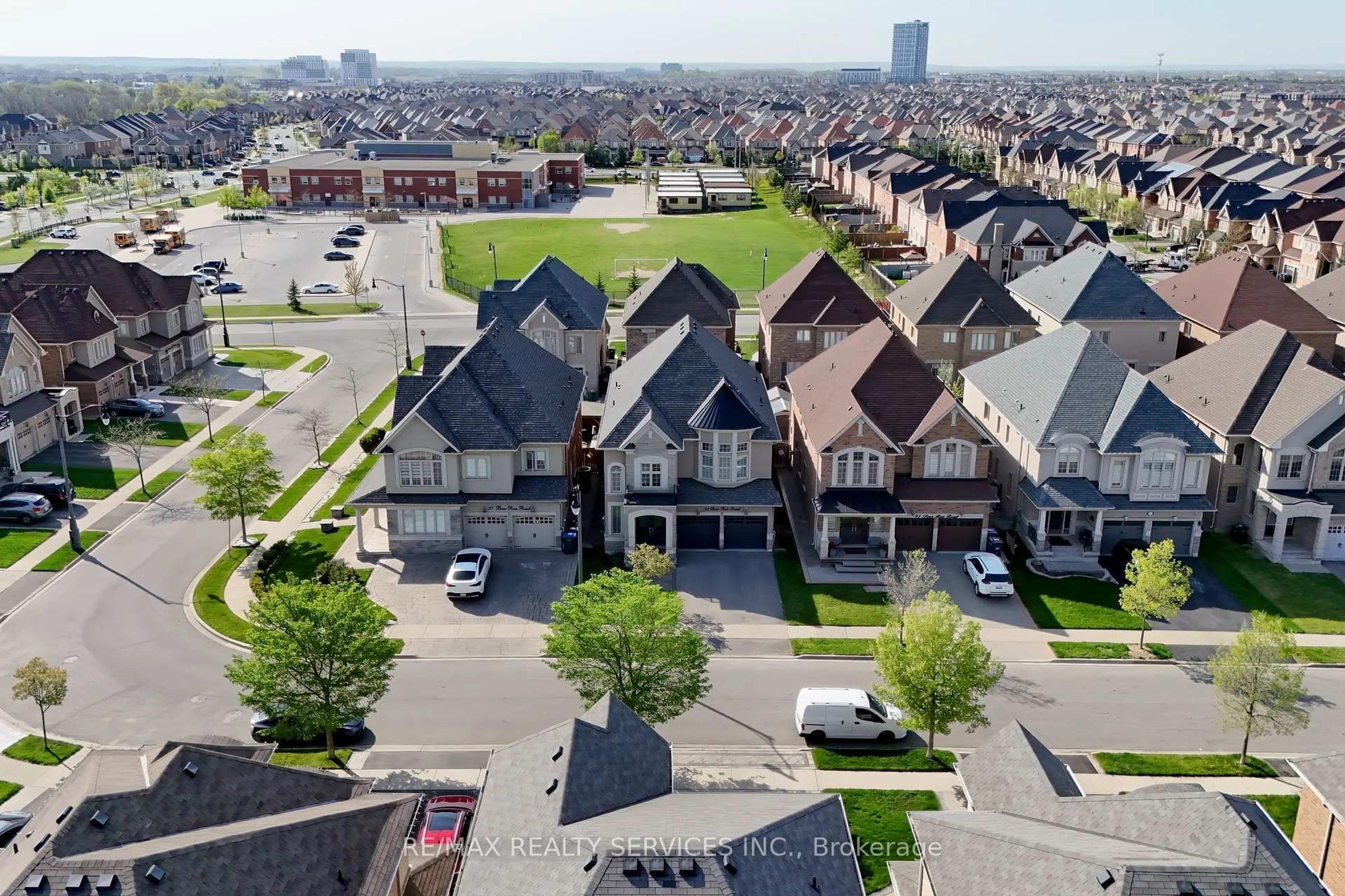 A pic from outside/outdoor area/front of a property/back of a property/a pic from drone, street for 93 Bear Run Rd, Brampton Ontario L6X 2Z9
