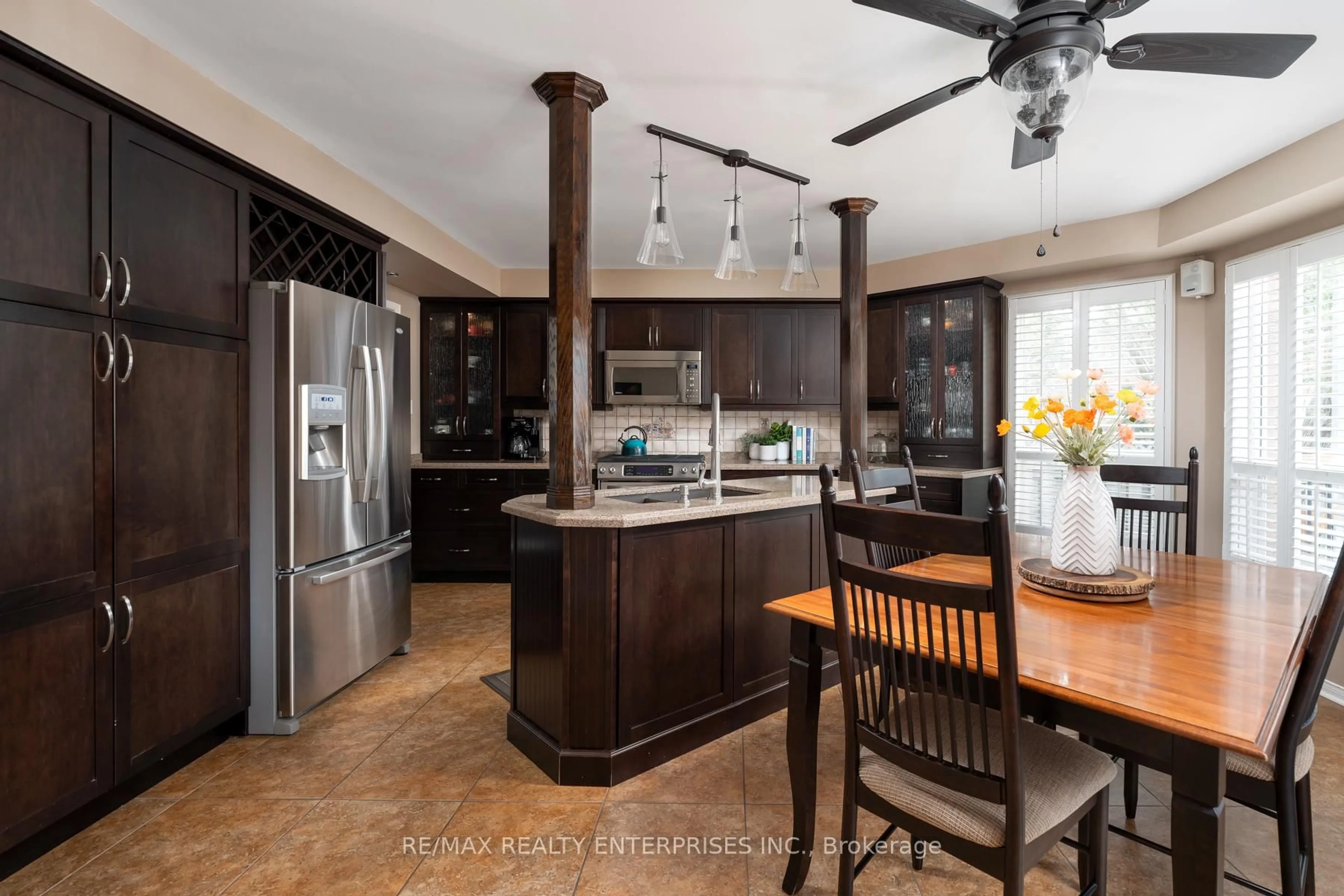 Open concept kitchen, ceramic/tile floor for 3397 Water Lily Crt, Mississauga Ontario L5N 6B5