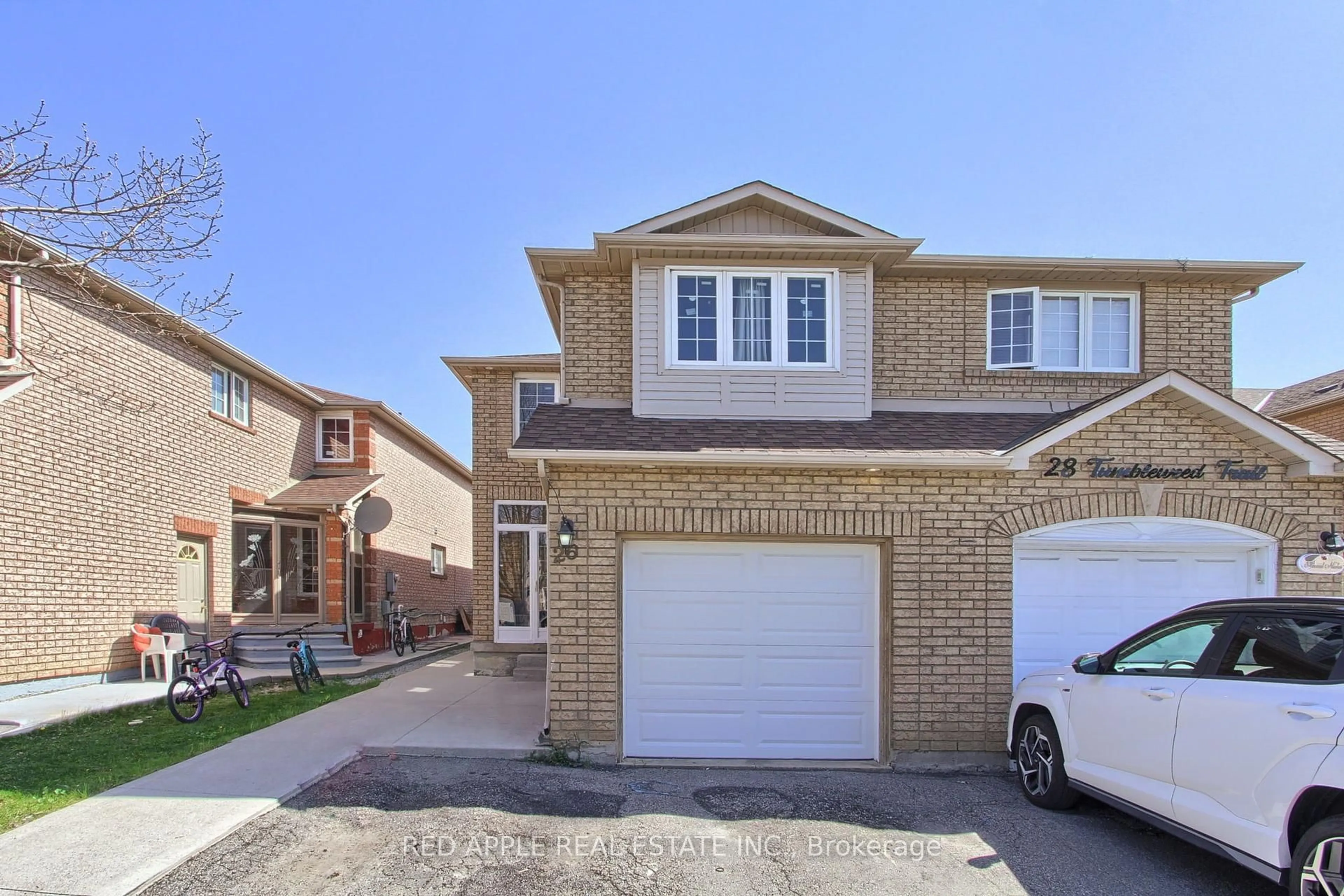 Home with brick exterior material, street for 26 Tumbleweed Tr, Brampton Ontario L6Y 5A1