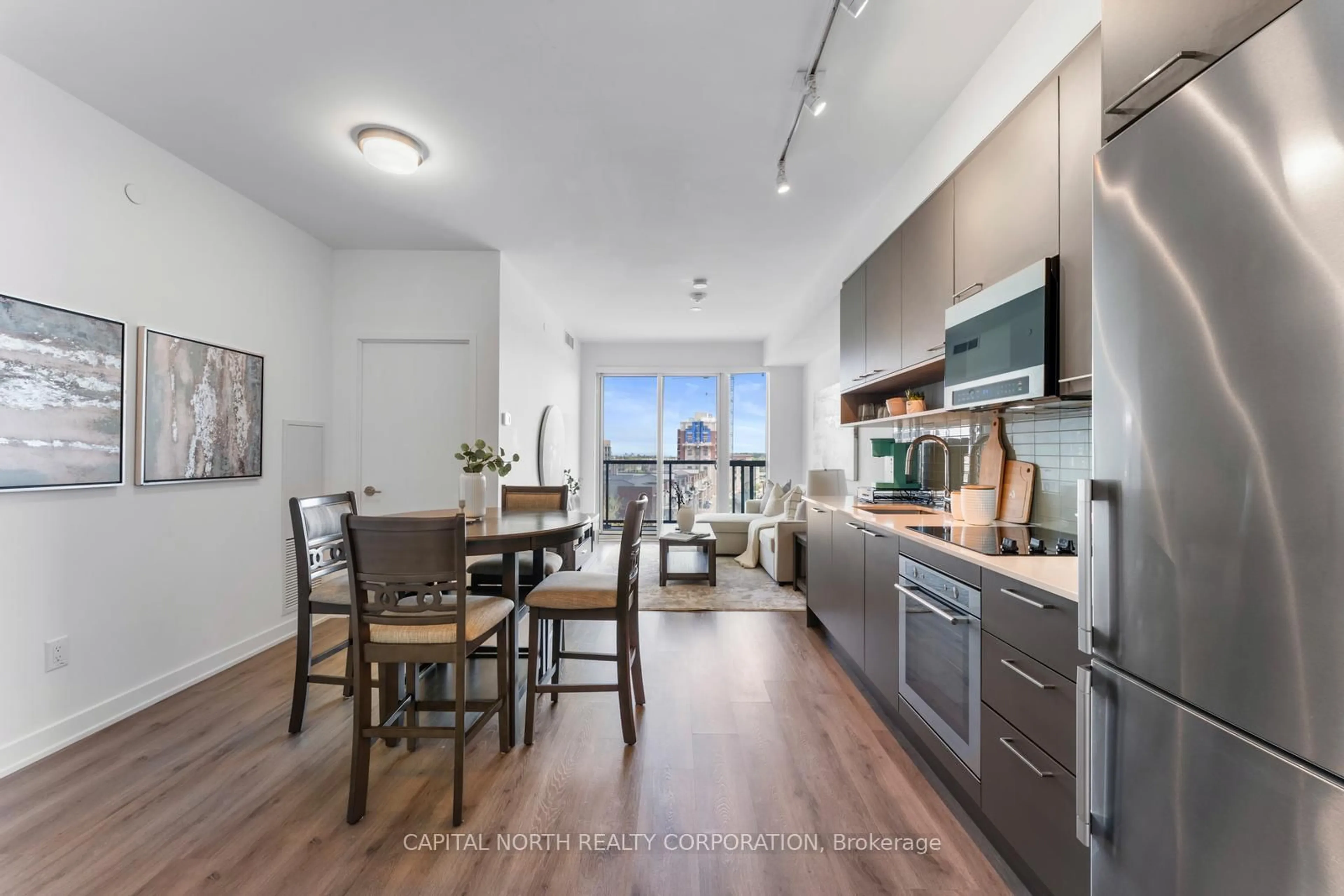 Open concept kitchen, wood/laminate floor for 3005 Pine Glen Rd #514, Oakville Ontario L6M 4J3