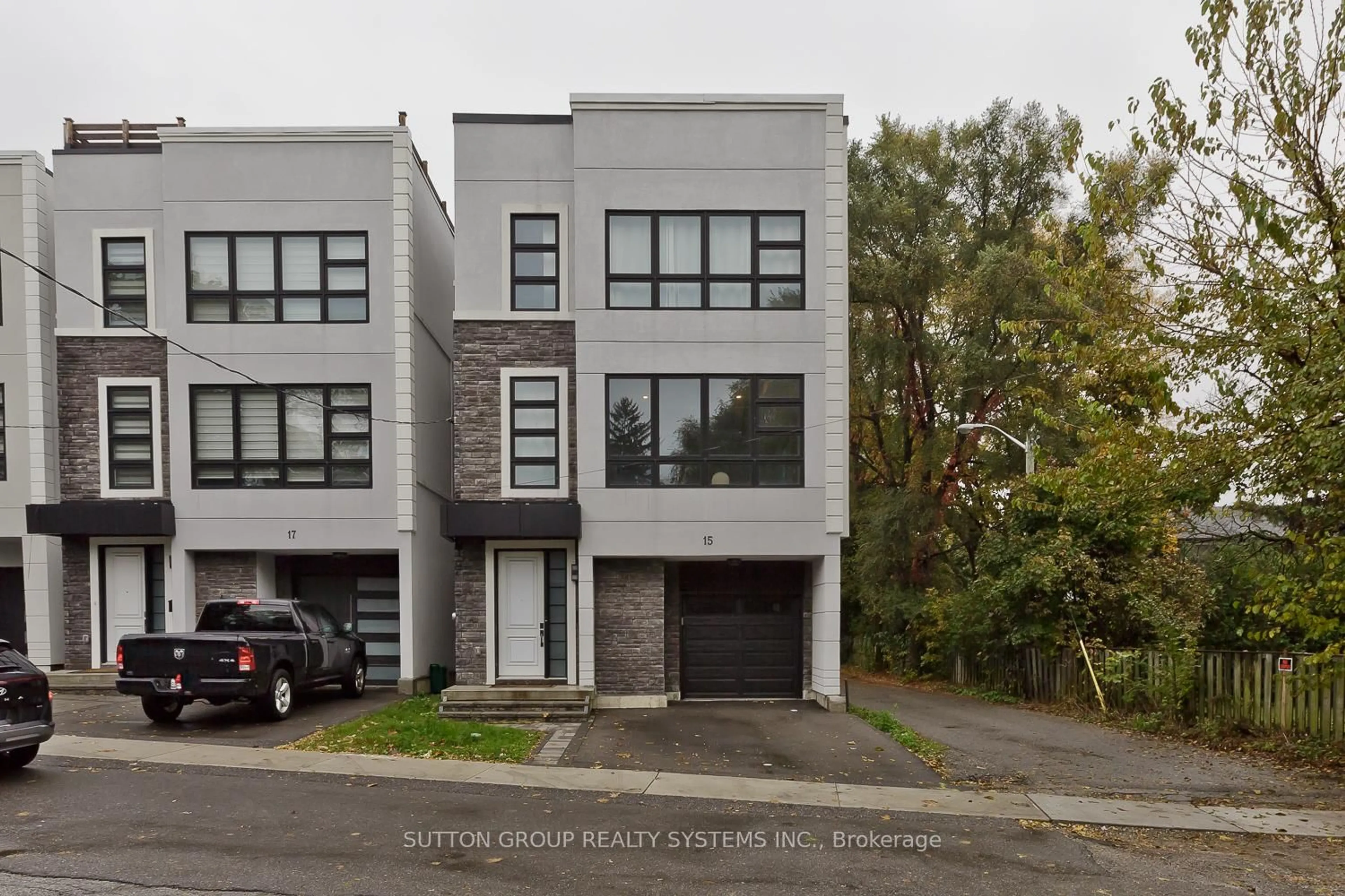 Home with vinyl exterior material, street for 15 Old Oak Dr, Toronto Ontario M9A 1A3