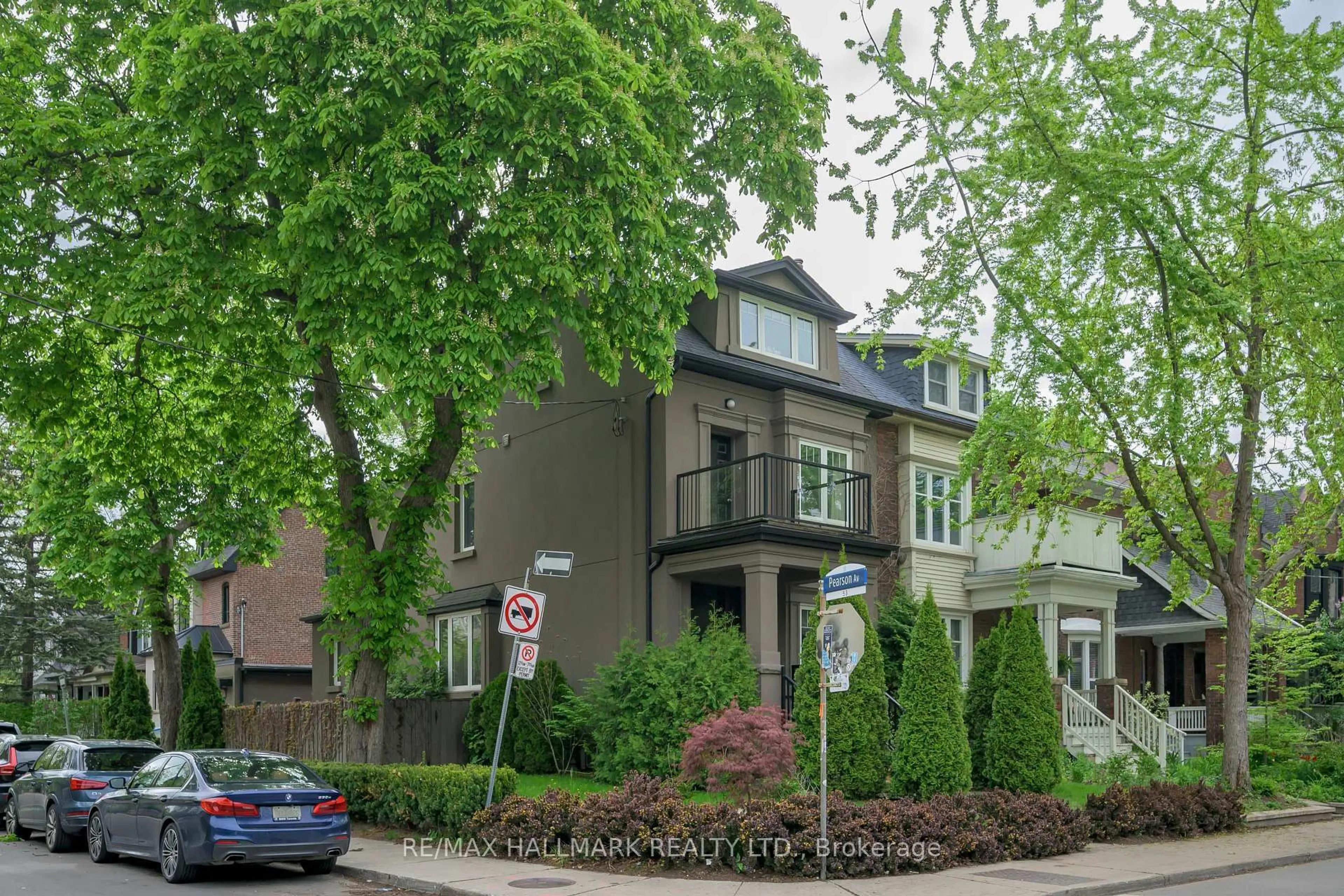 Home with brick exterior material, street for 85 Sorauren Ave, Toronto Ontario M6R 2E1