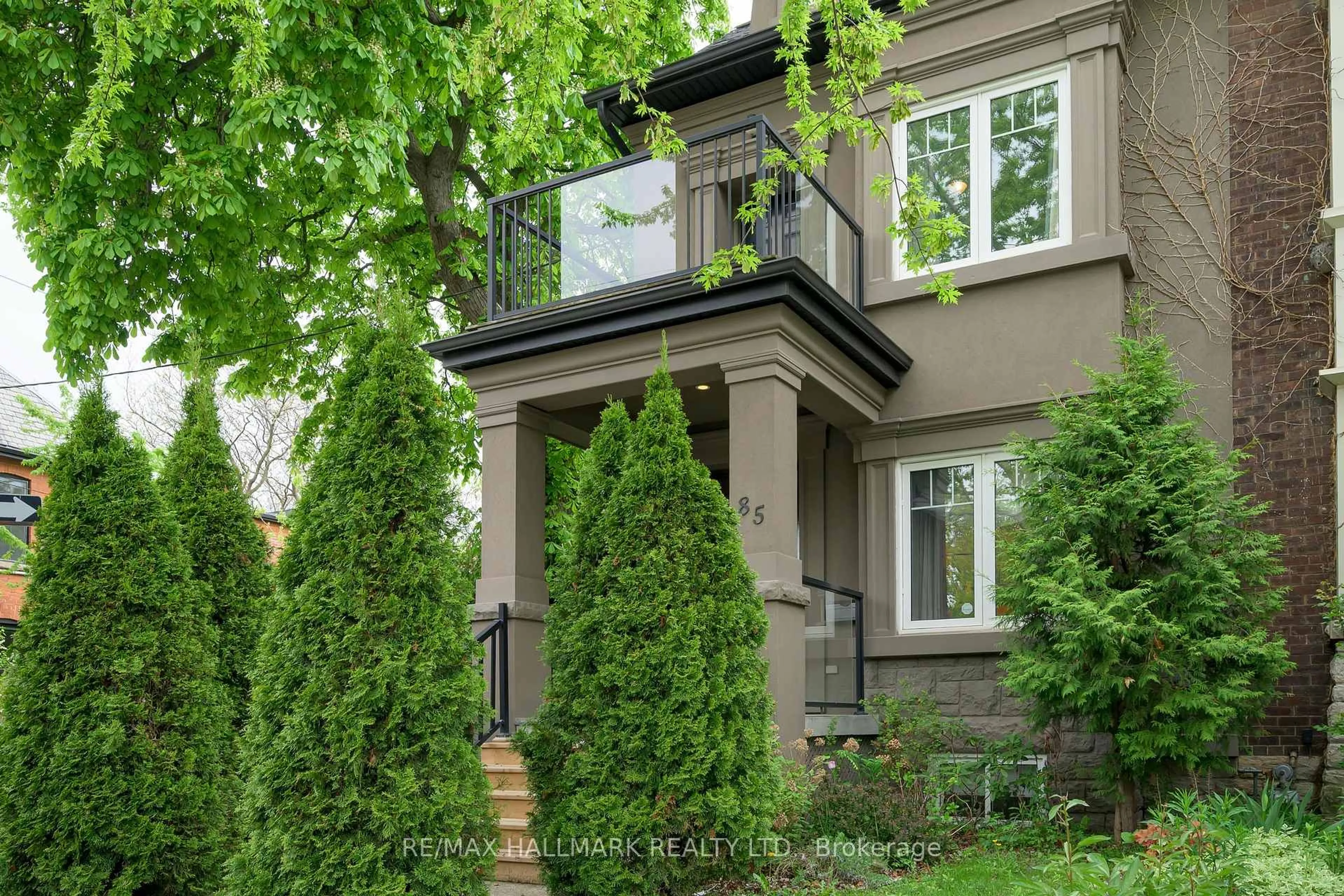 Home with brick exterior material, street for 85 Sorauren Ave, Toronto Ontario M6R 2E1