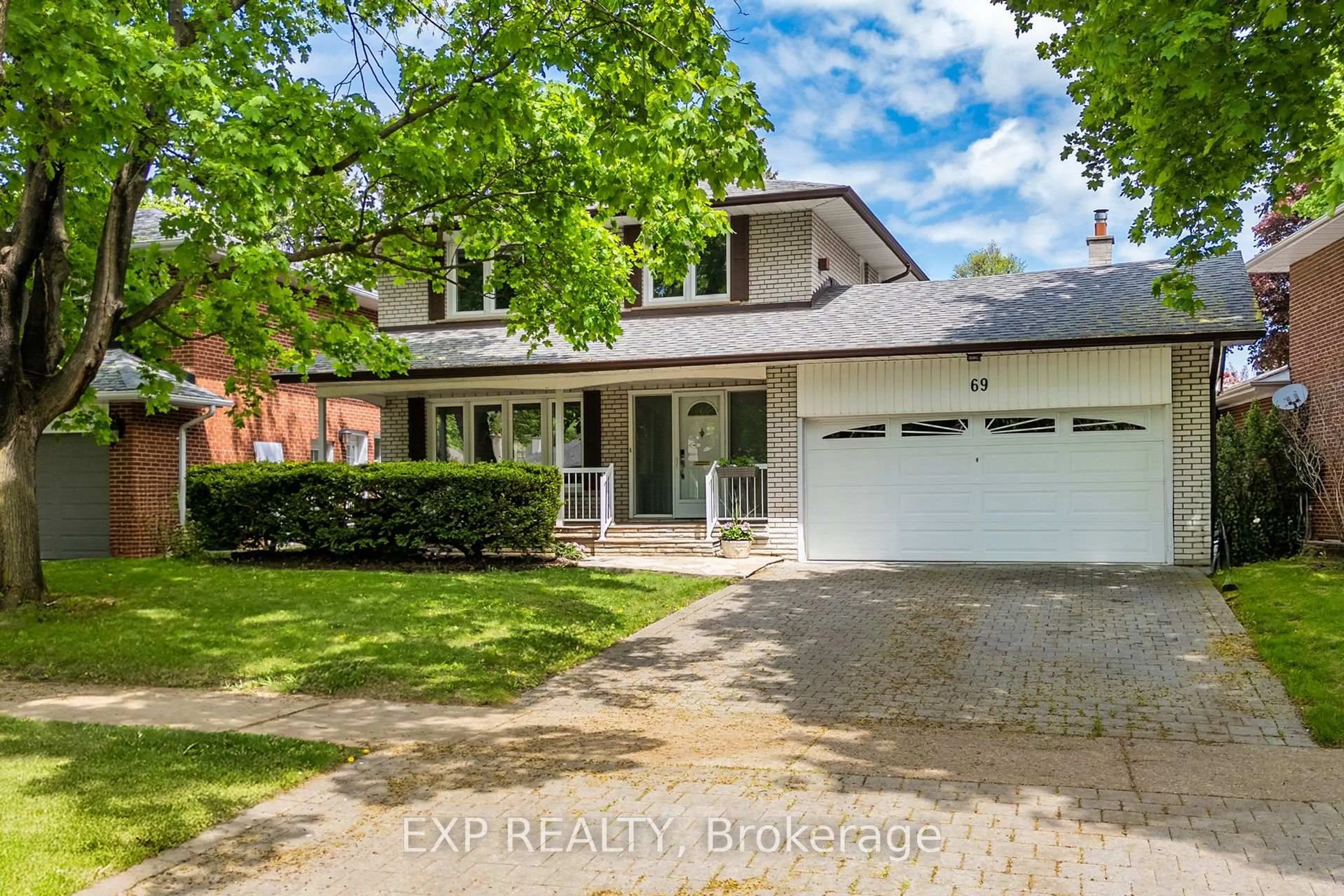 Home with brick exterior material, street for 69 Pettit Dr, Toronto Ontario M9R 2W6