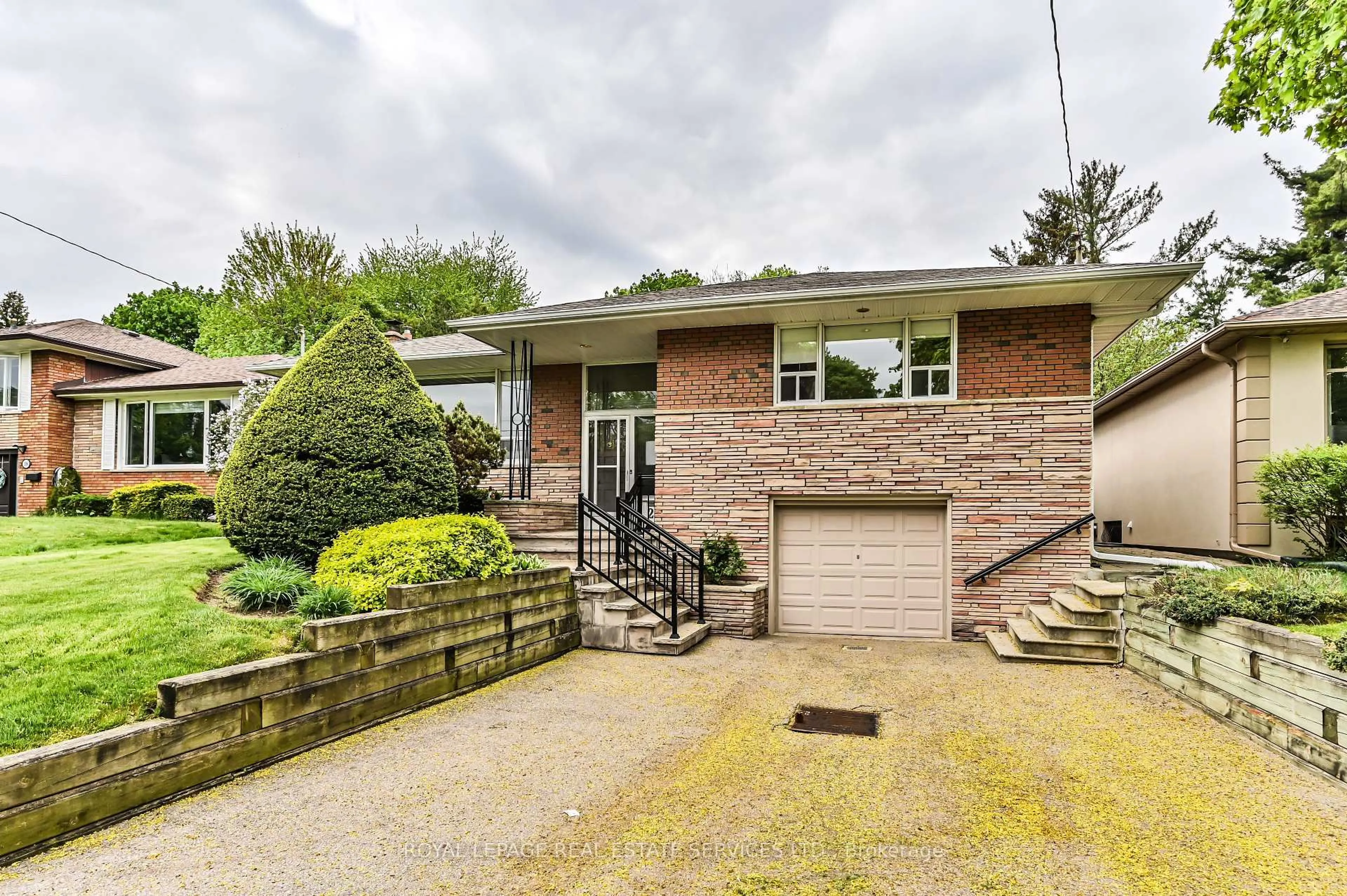 Home with brick exterior material, street for 20 Munhall Rd, Toronto Ontario M9P 1P9
