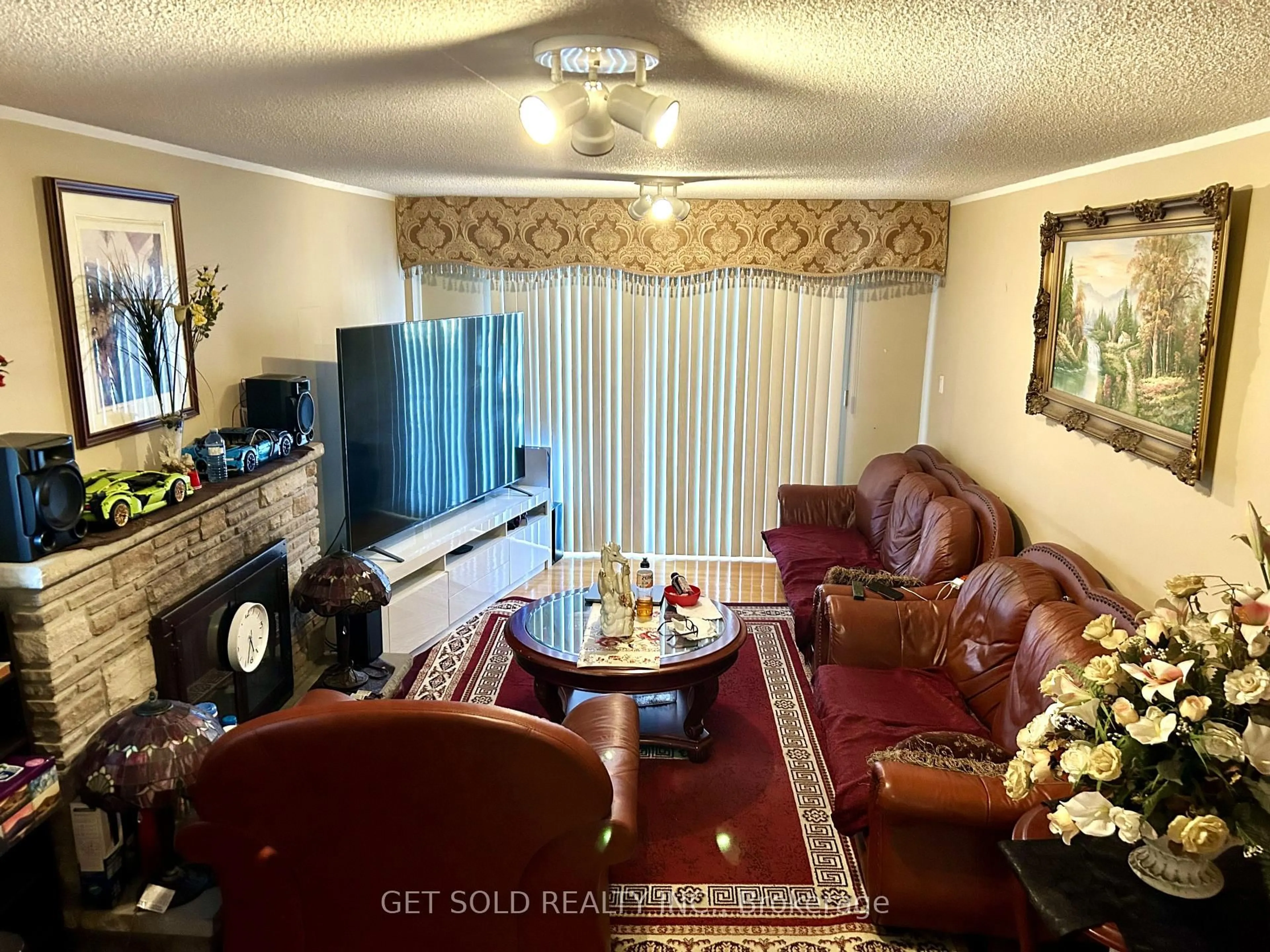 Living room with furniture, unknown for 73 Franel Cres, Toronto Ontario M9L 1B6