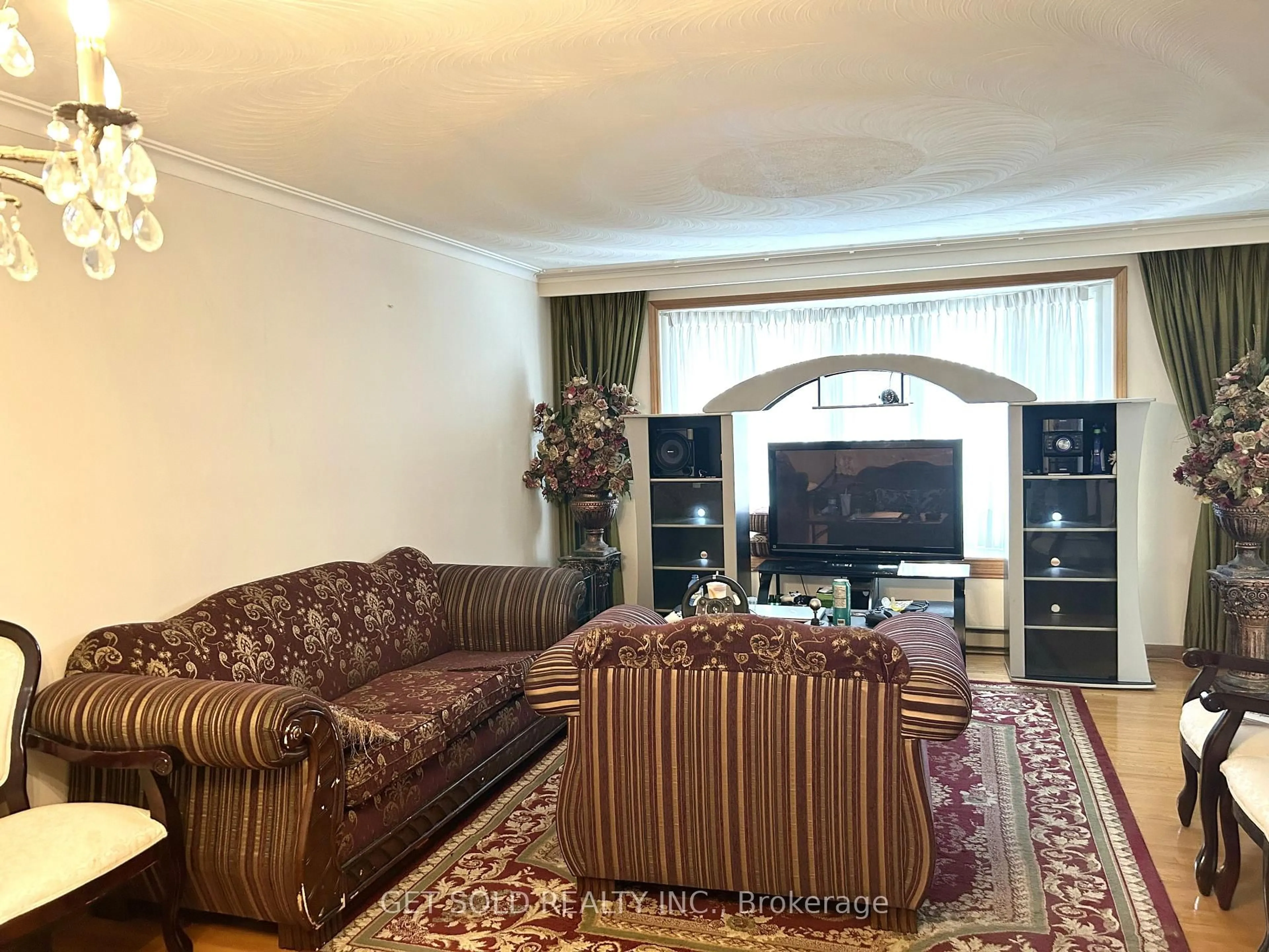 Living room with furniture, unknown for 73 Franel Cres, Toronto Ontario M9L 1B6