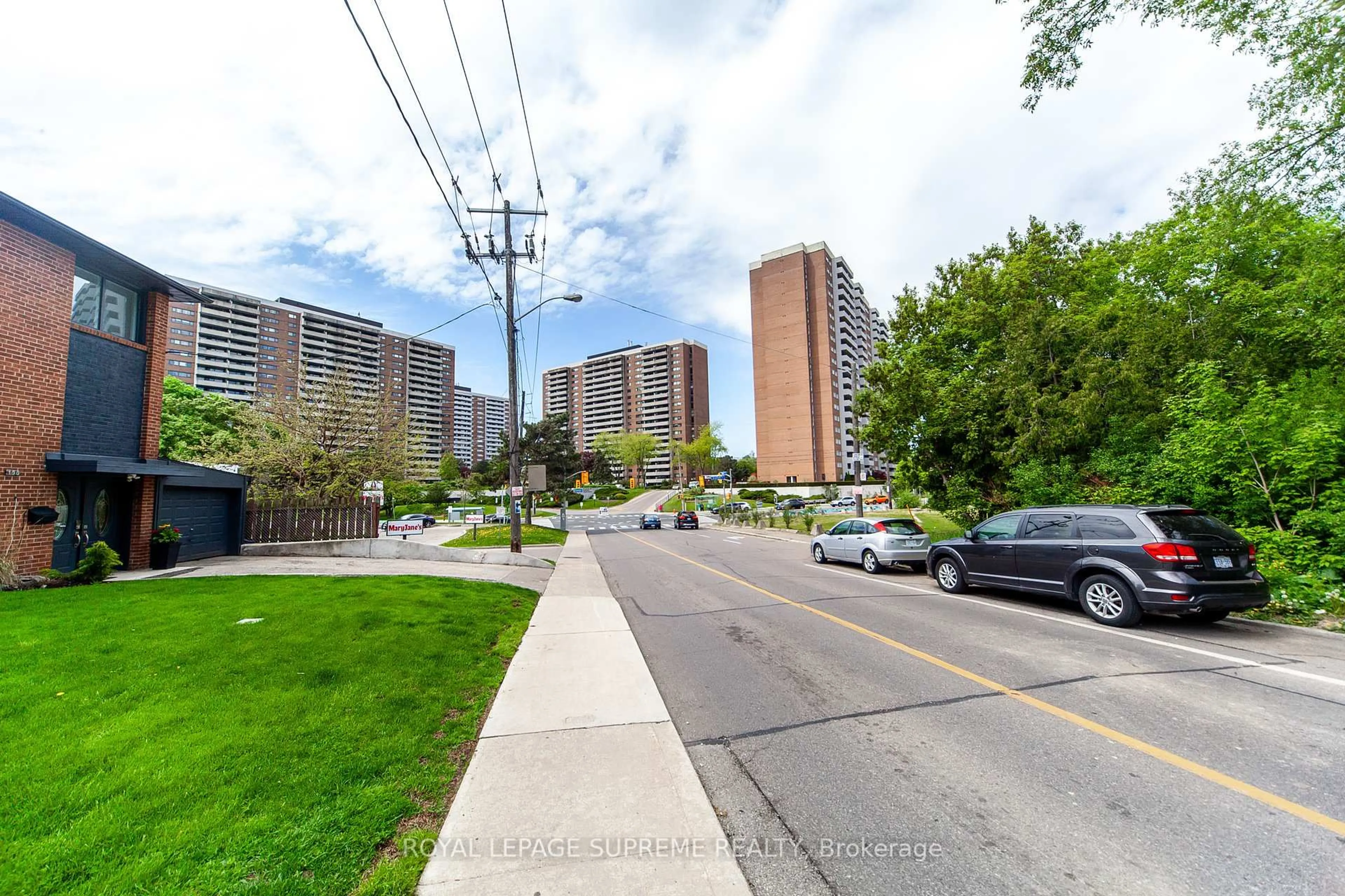 A pic from outside/outdoor area/front of a property/back of a property/a pic from drone, street for 270 Scarlett Rd #205, Toronto Ontario M6N 4X7