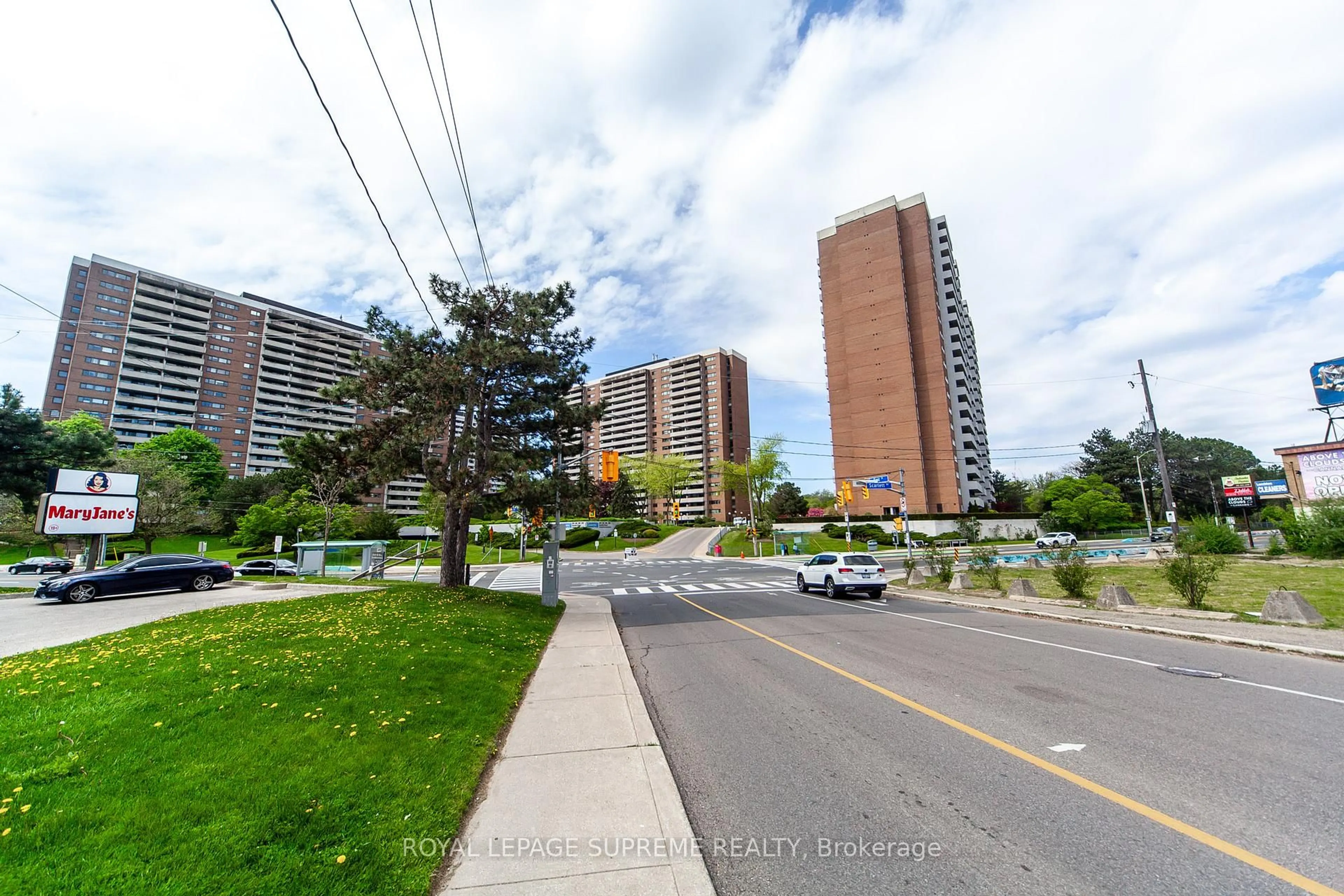 A pic from outside/outdoor area/front of a property/back of a property/a pic from drone, street for 270 Scarlett Rd #205, Toronto Ontario M6N 4X7