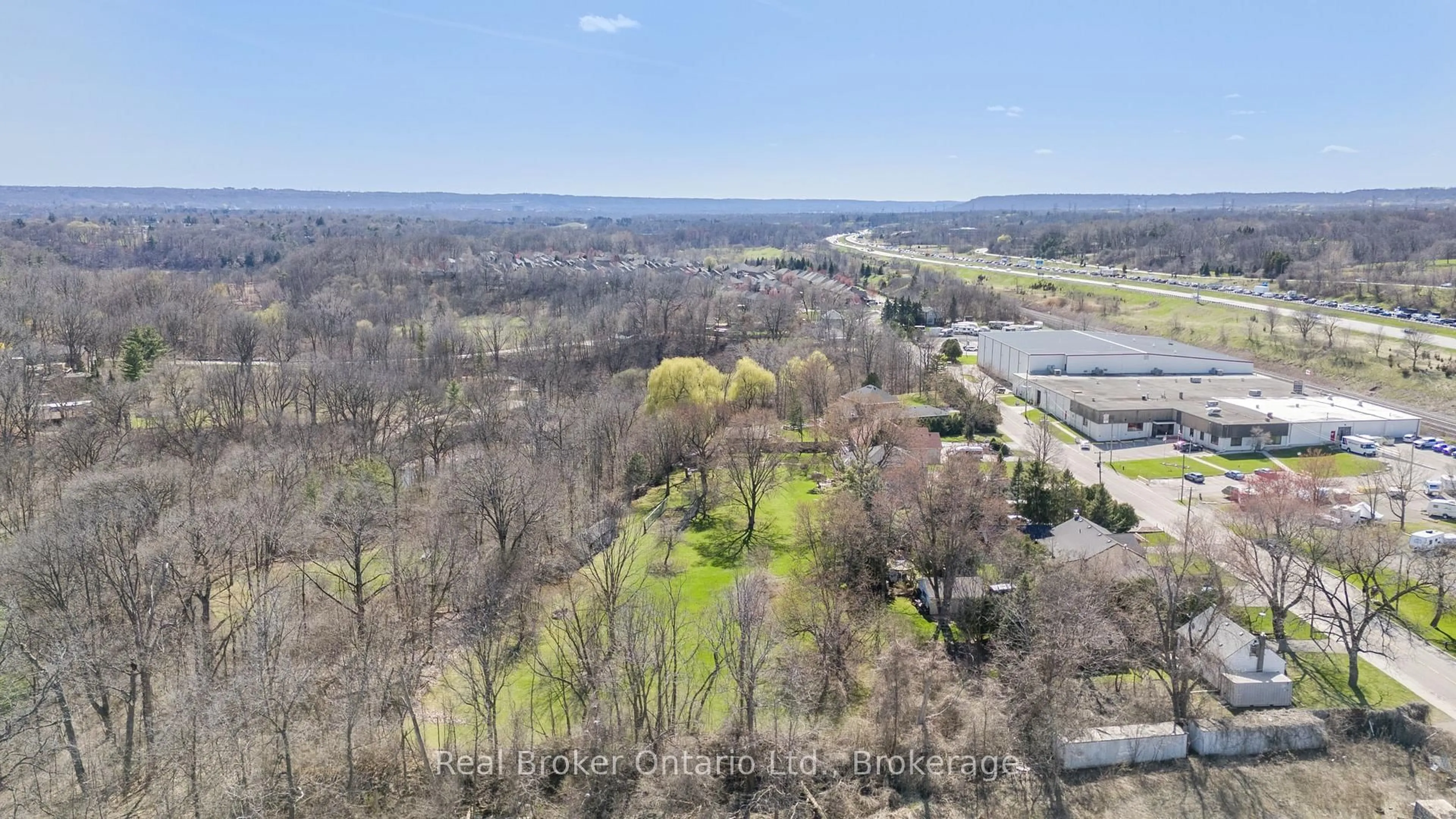 A pic from outside/outdoor area/front of a property/back of a property/a pic from drone, water/lake/river/ocean view for 266 Sumach Dr, Burlington Ontario L7T 0B5