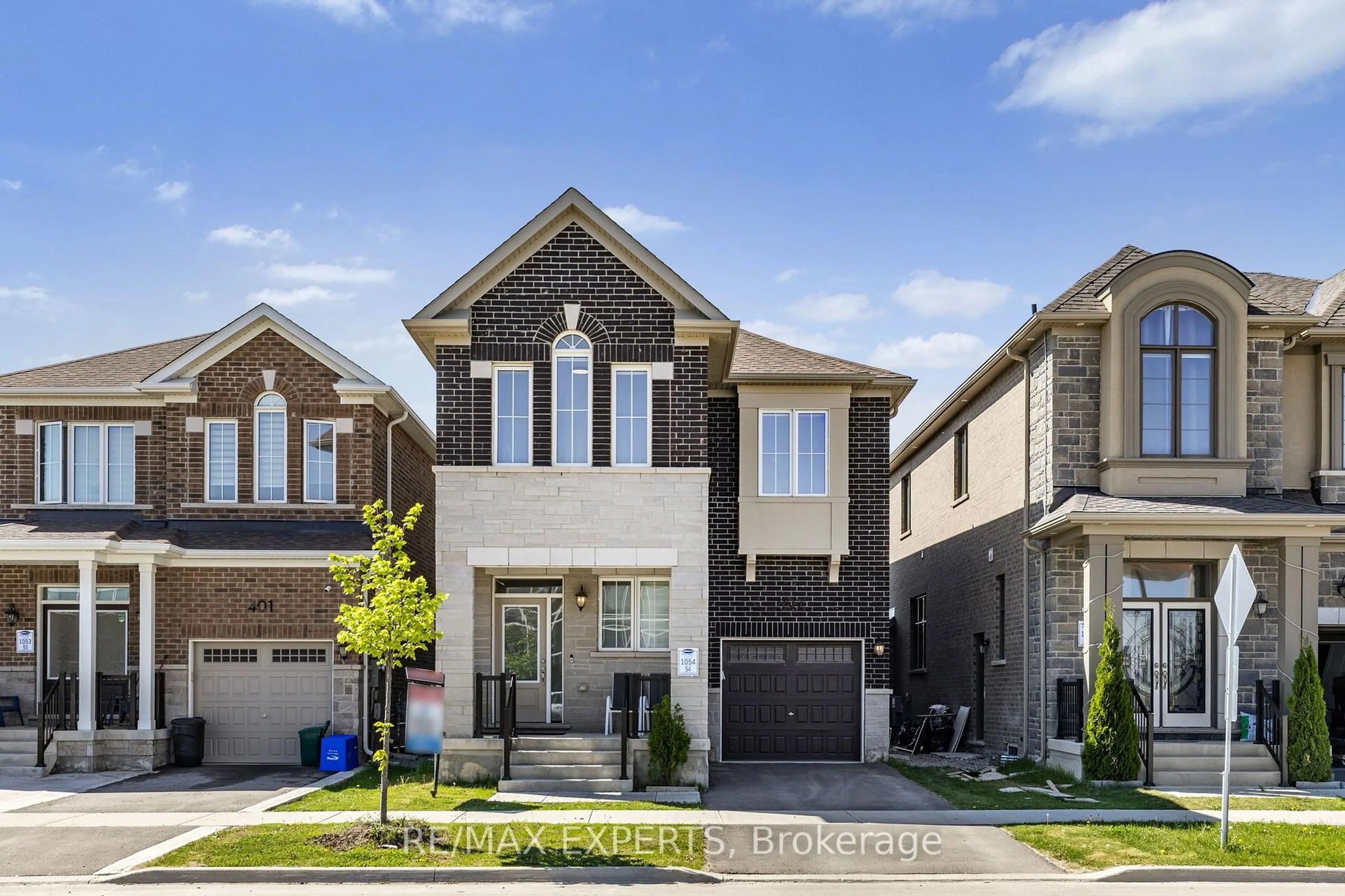 Home with brick exterior material, street for 397 Gordon Krantz Ave, Milton Ontario L9E 1W1
