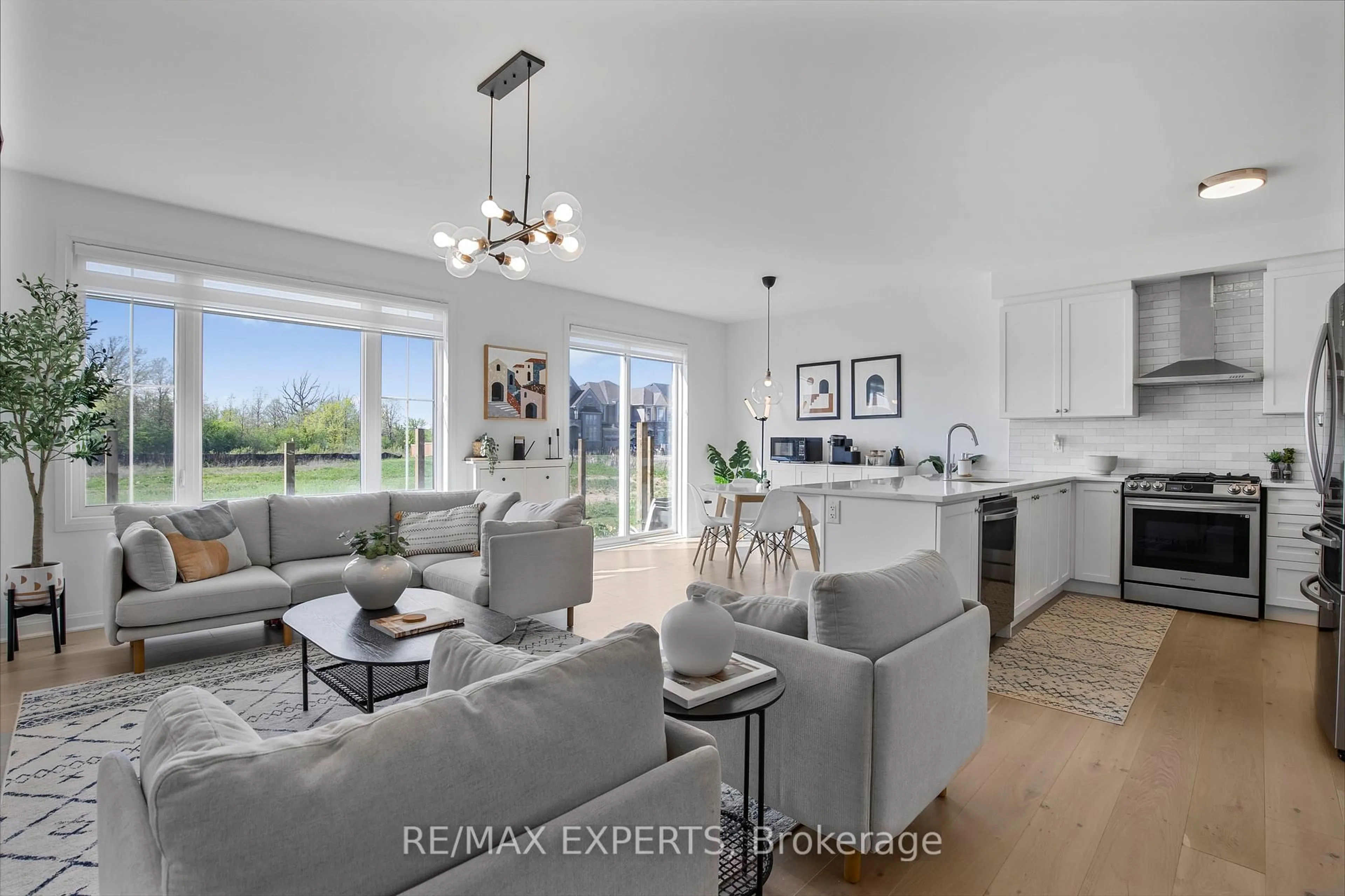 Open concept kitchen, unknown for 397 Gordon Krantz Ave, Milton Ontario L9E 1W1