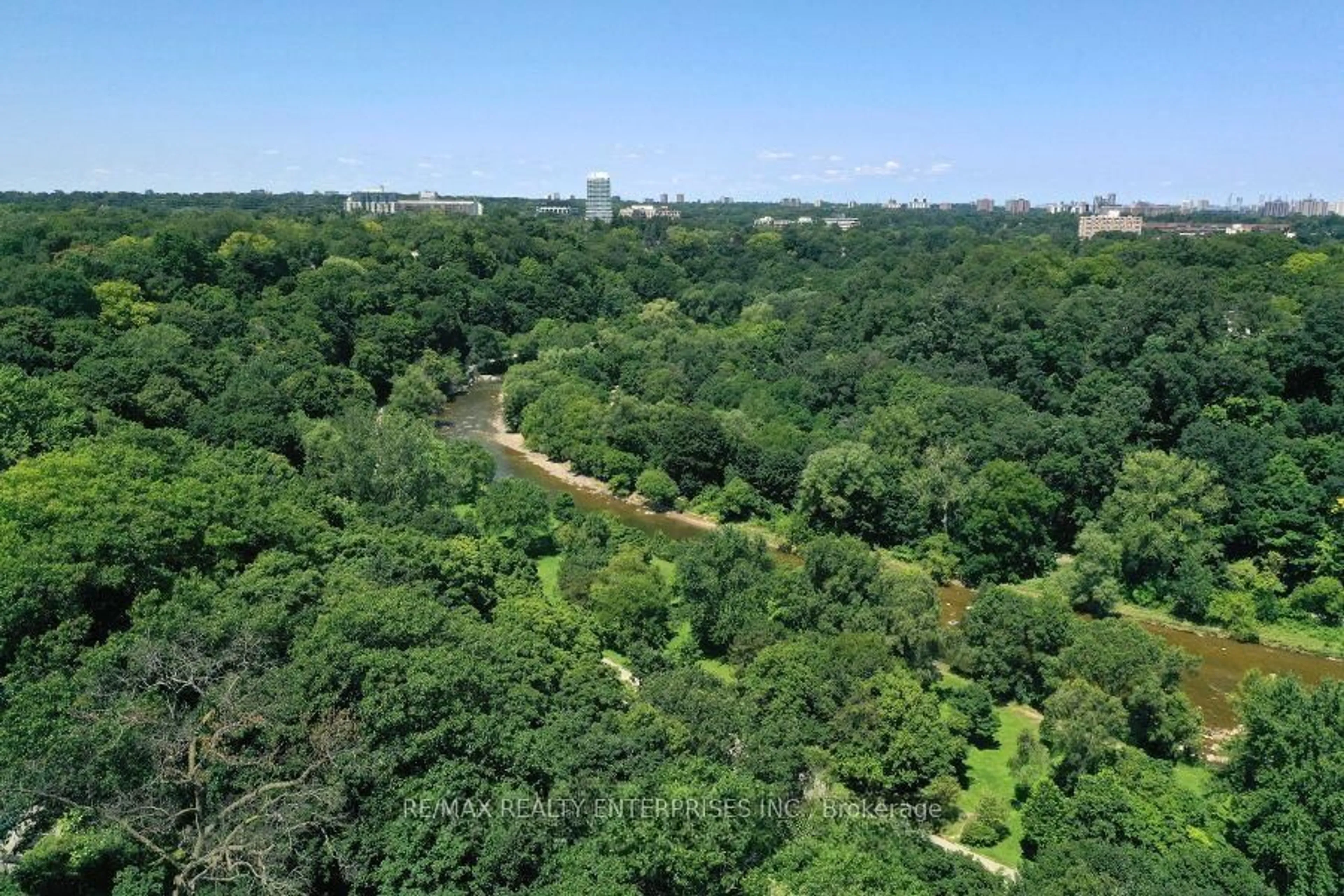 A pic from outside/outdoor area/front of a property/back of a property/a pic from drone, forest/trees view for 100 Old Mill Road Rd, Toronto Ontario M8X 1G8
