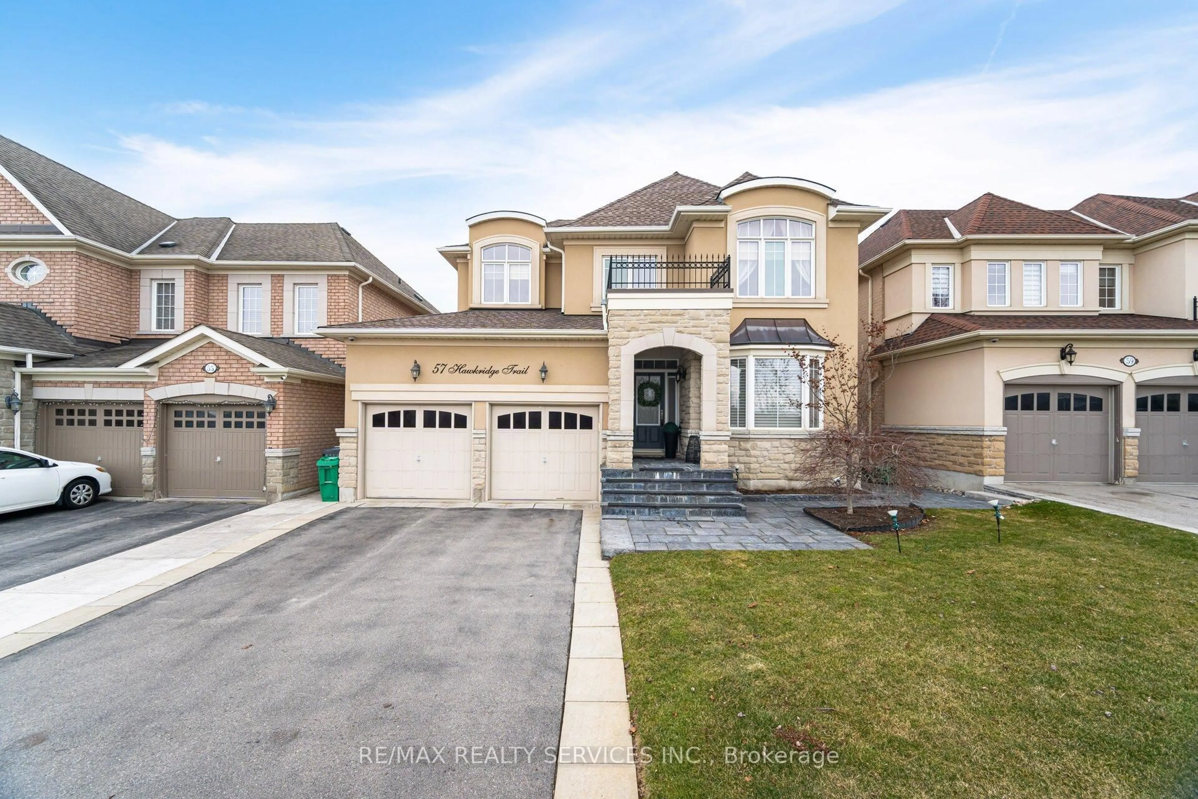 Home with brick exterior material, street for 57 Hawkridge Tr, Brampton Ontario L6P 2T6