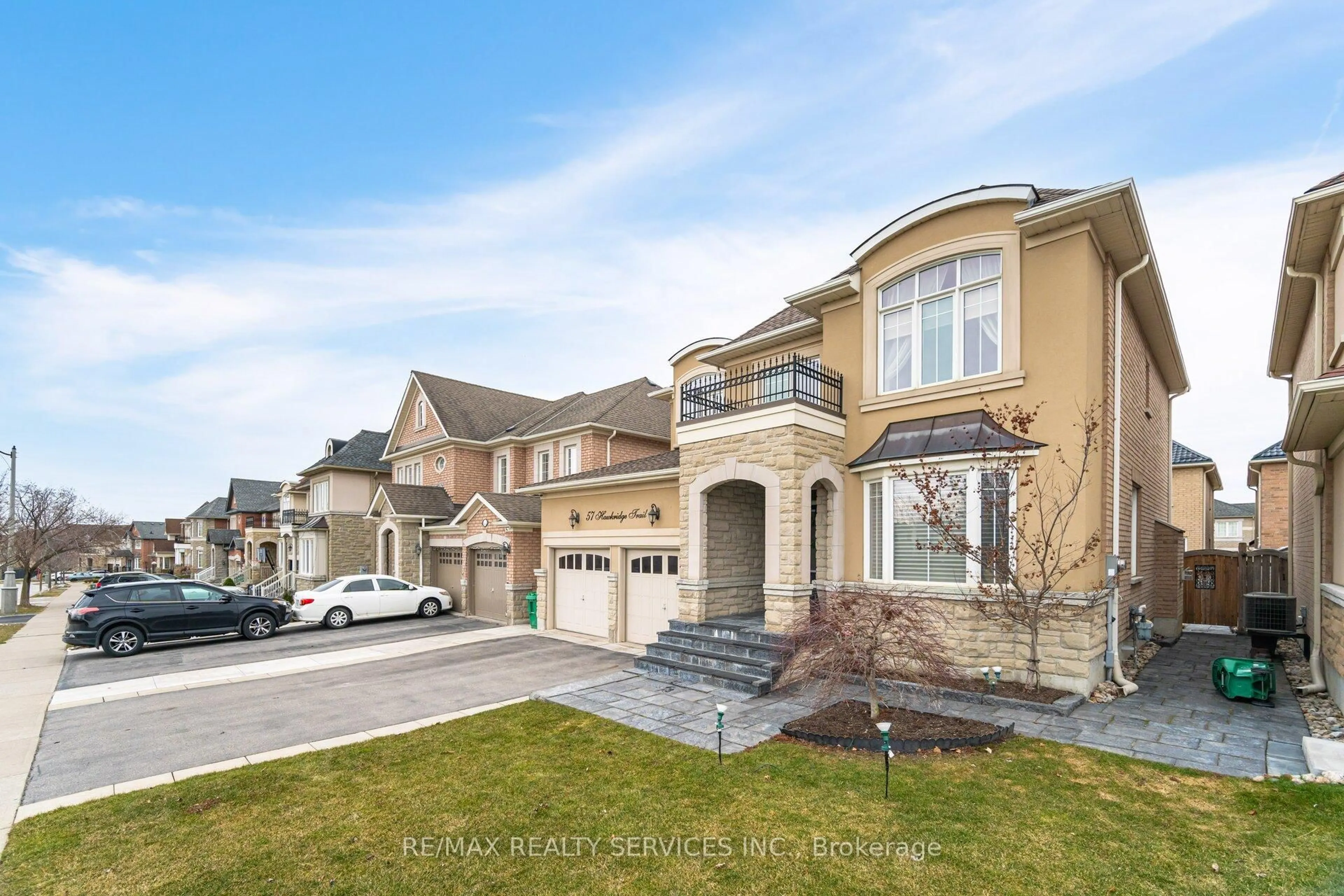 A pic from outside/outdoor area/front of a property/back of a property/a pic from drone, street for 57 Hawkridge Tr, Brampton Ontario L6P 2T6