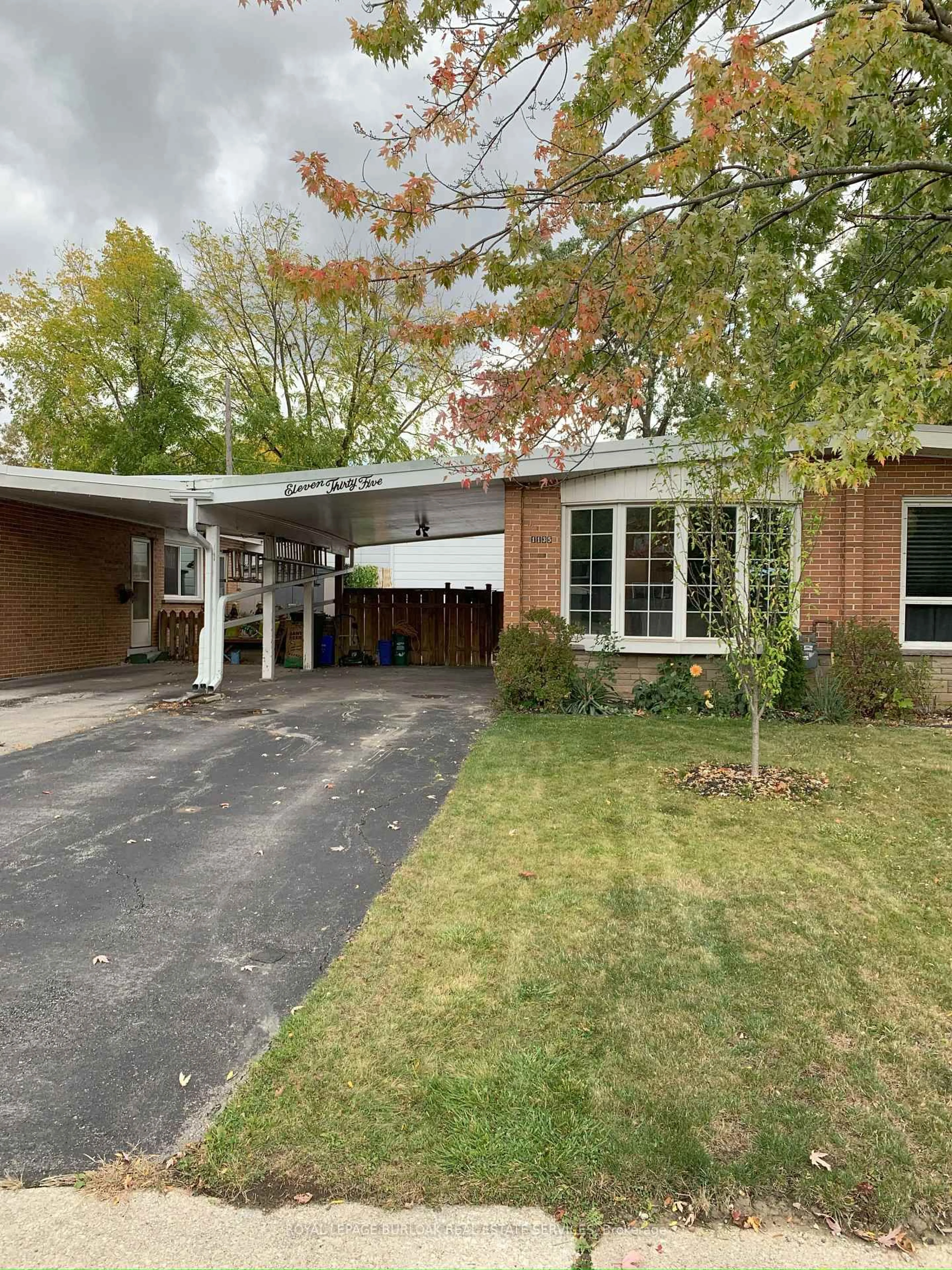 Home with brick exterior material, street for 1135 Tavistock Dr, Burlington Ontario L7P 2N3