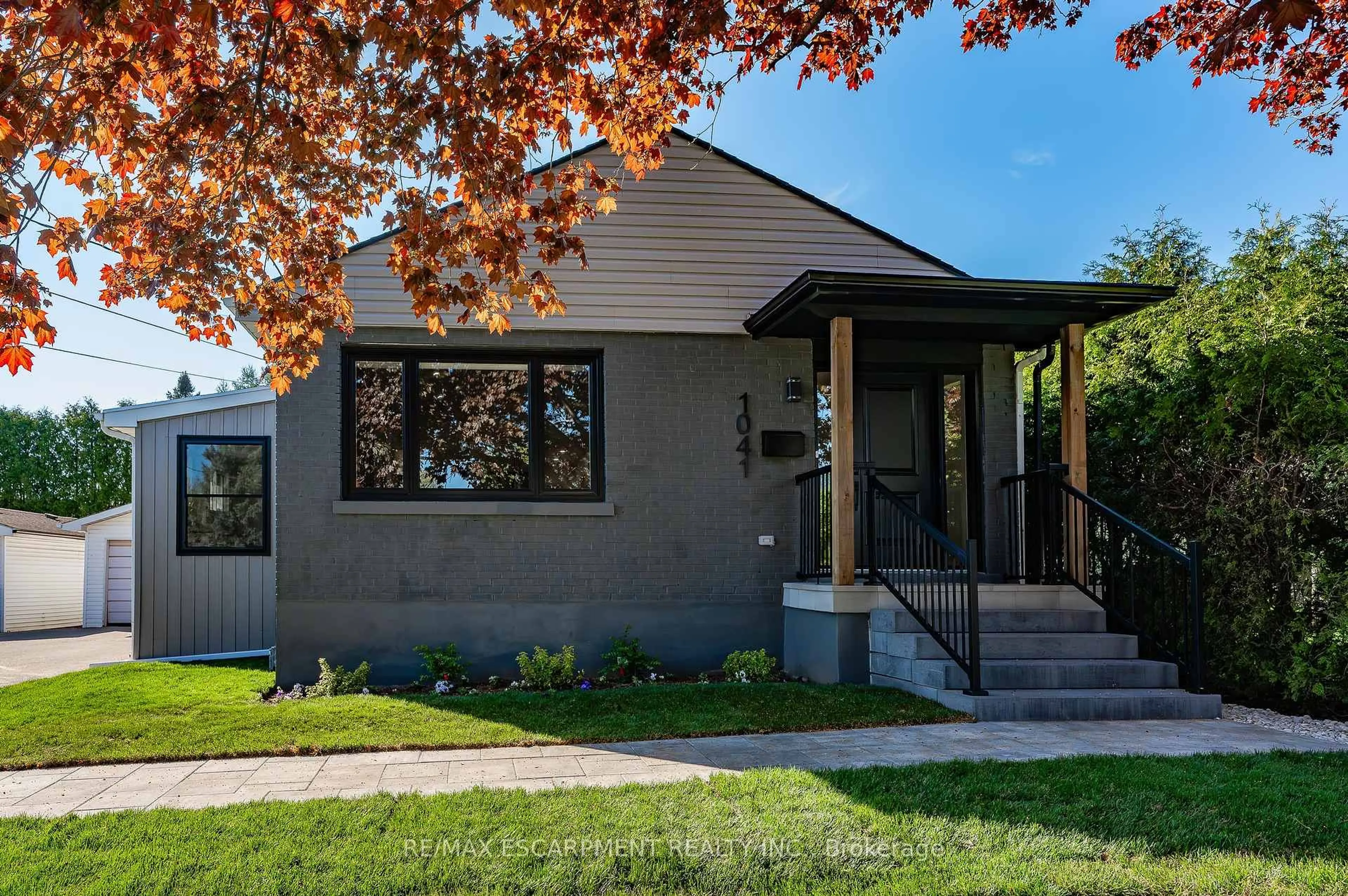 Home with vinyl exterior material, street for 1041 Shepherd's Dr, Burlington Ontario L7T 3R4