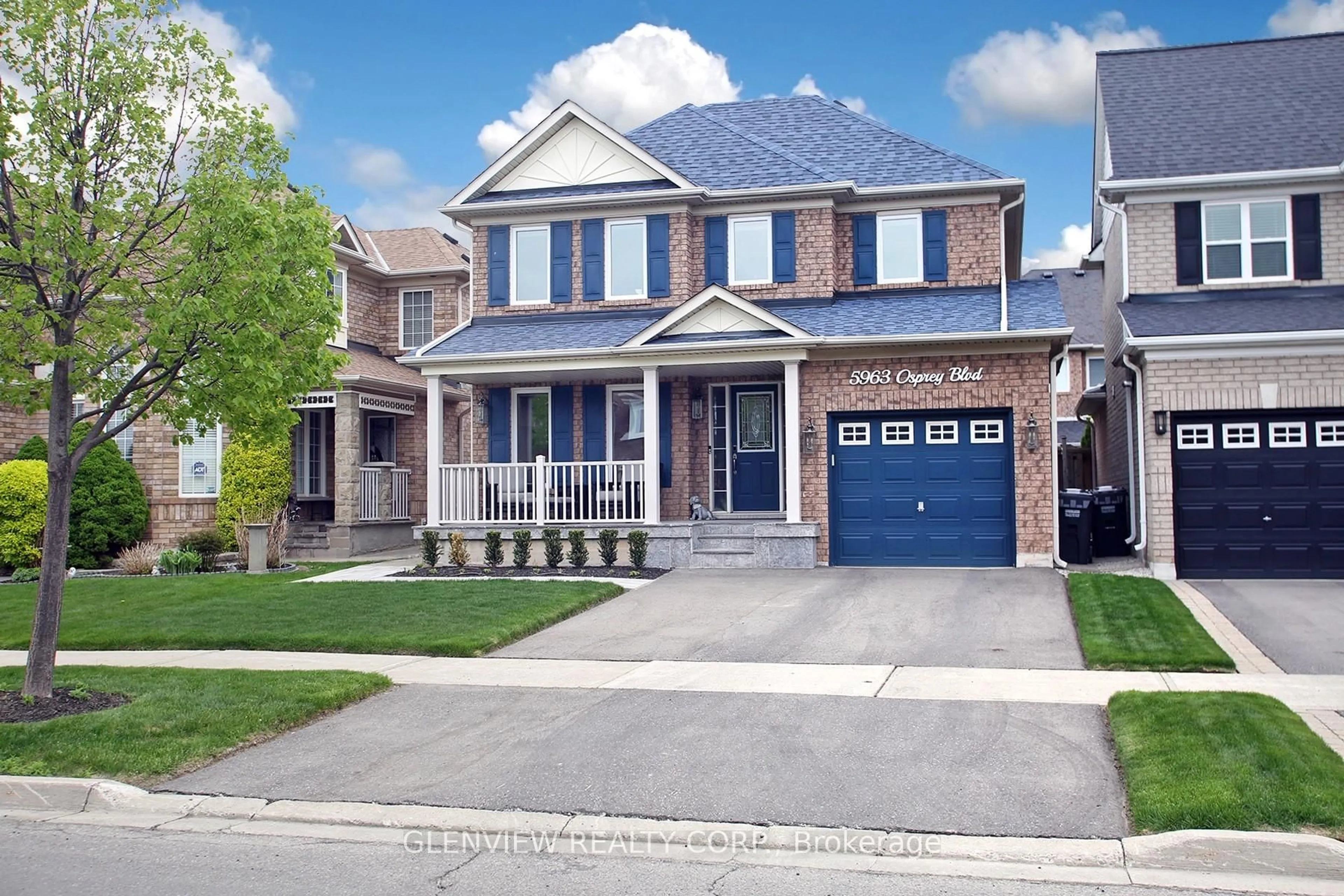 Home with brick exterior material, street for 5963 Osprey Blvd, Mississauga Ontario L5N 8K1
