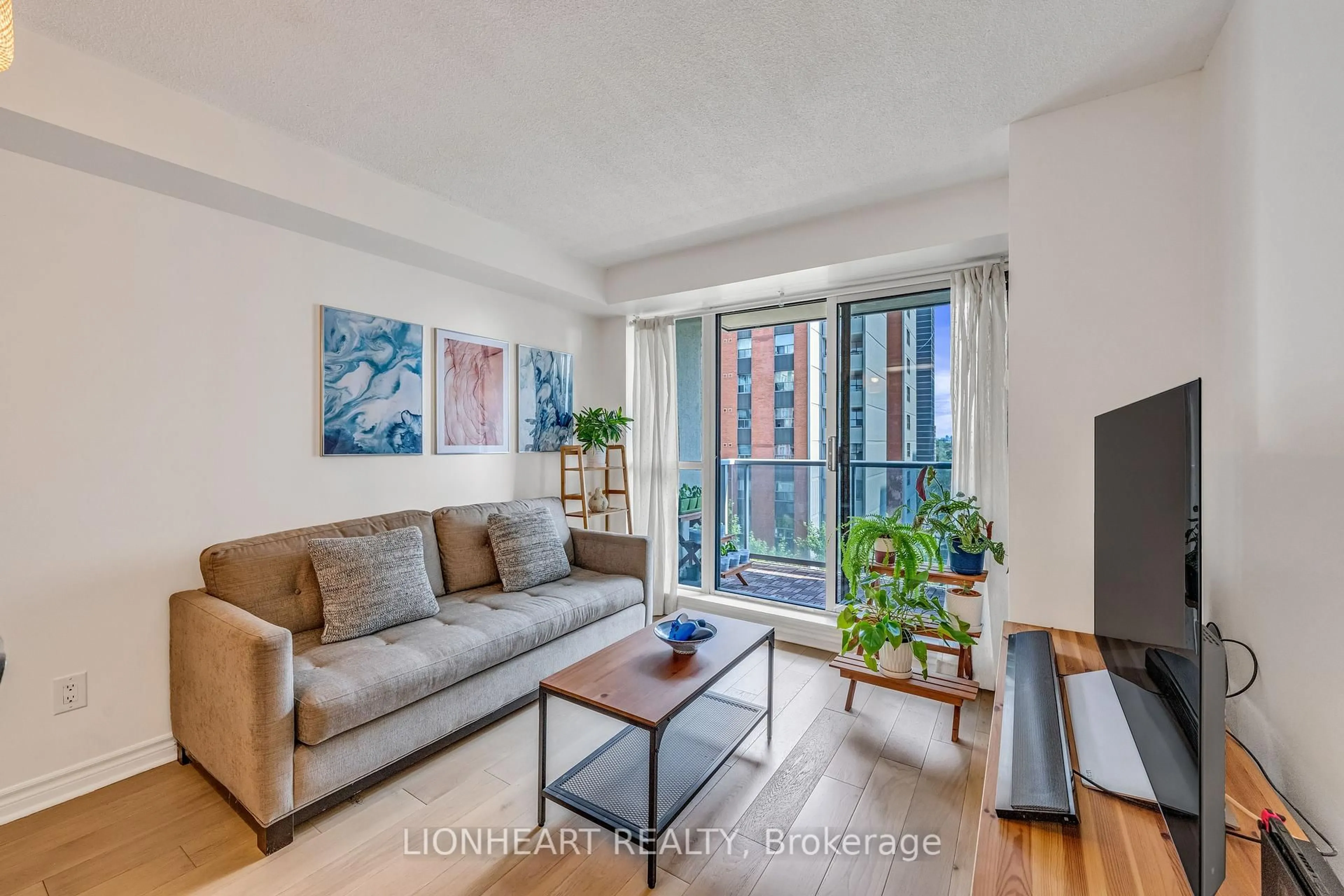 Living room with furniture, unknown for 5 Michael Power Pl #709, Toronto Ontario M9A 0A3