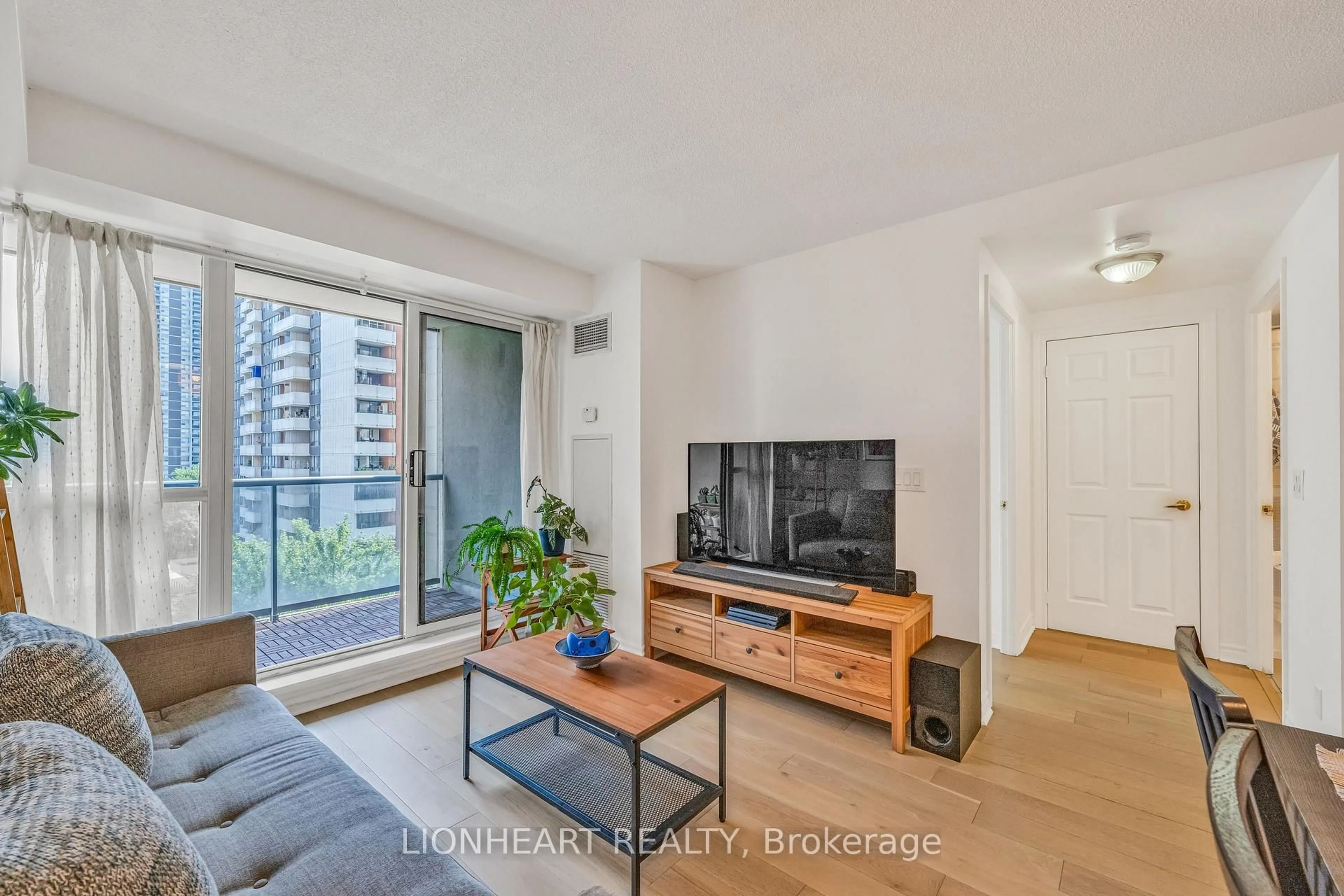 Living room with furniture, unknown for 5 Michael Power Pl #709, Toronto Ontario M9A 0A3