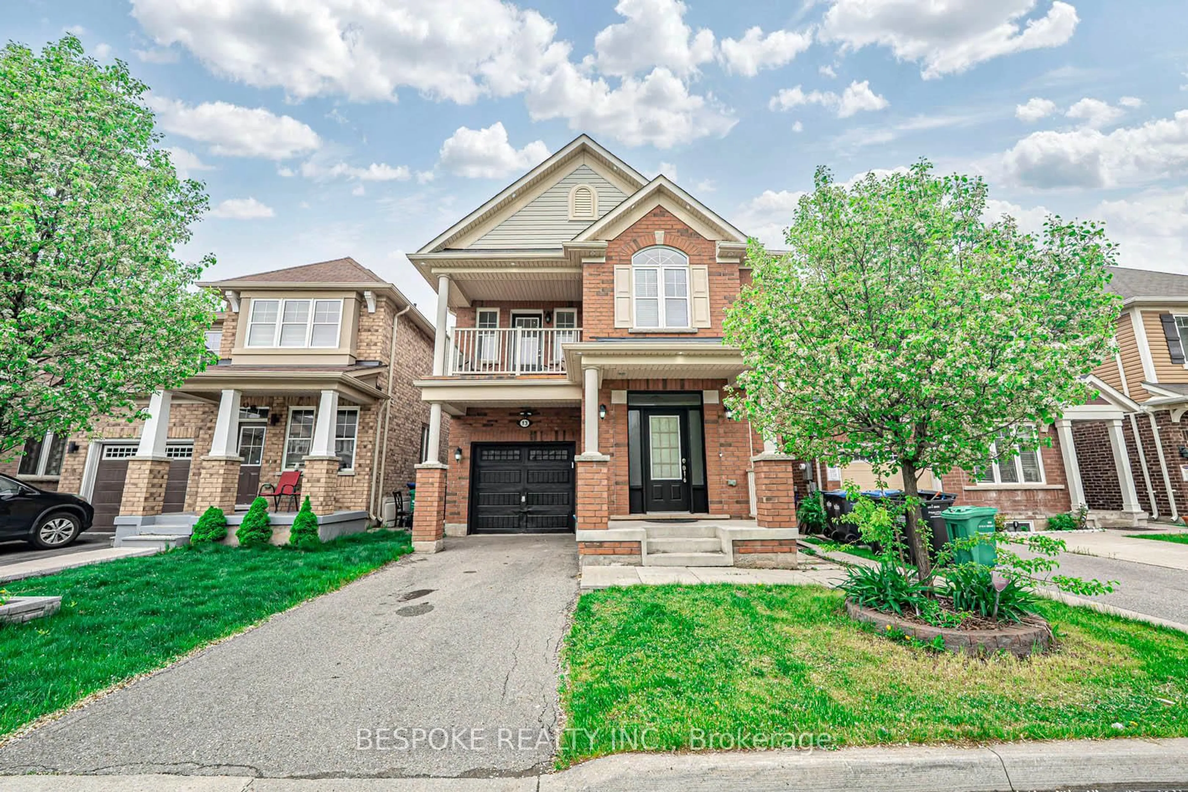 Home with brick exterior material, street for 13 Miracle Tr, Brampton Ontario L7A 0Y3
