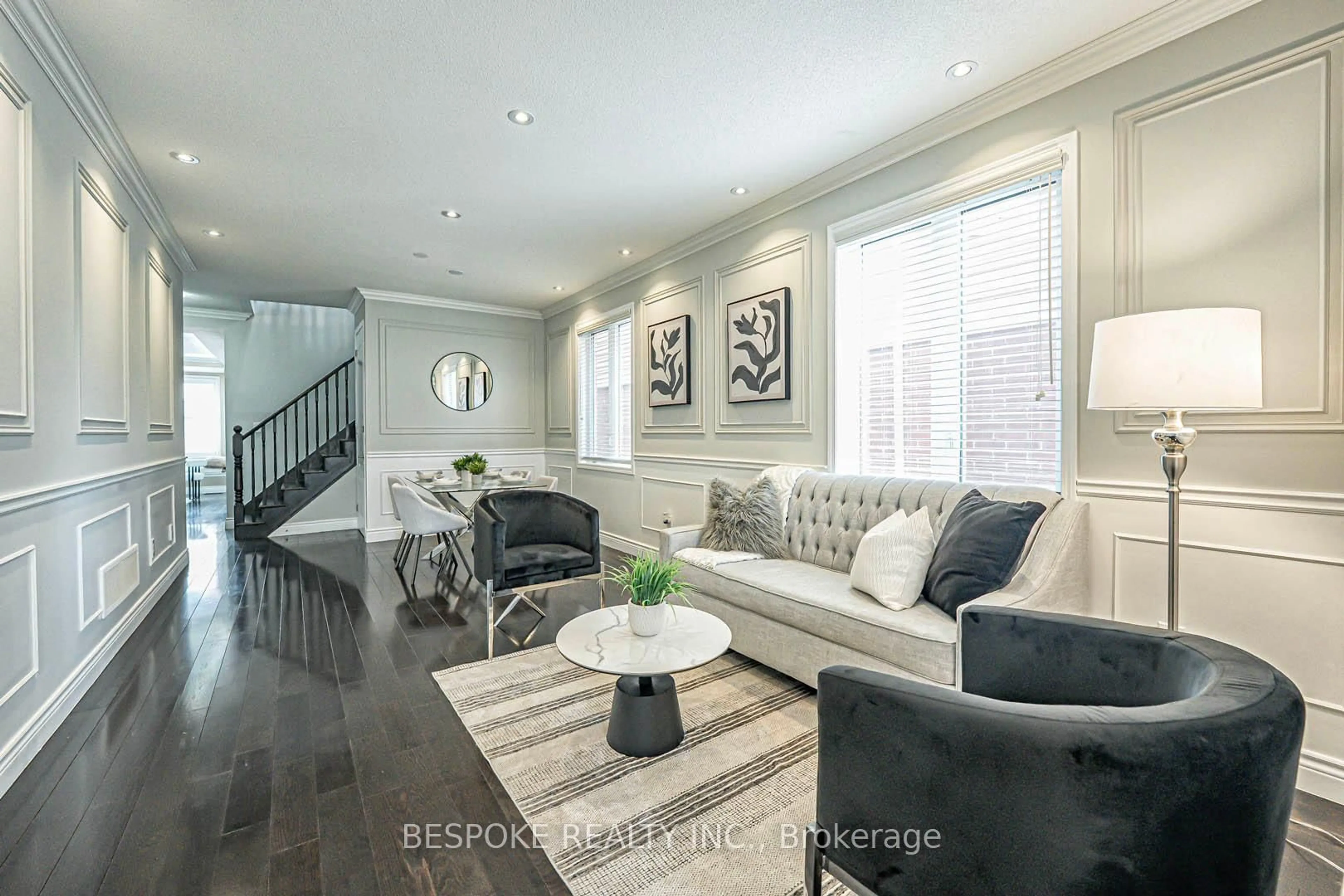 Living room with furniture, wood/laminate floor for 13 Miracle Tr, Brampton Ontario L7A 0Y3