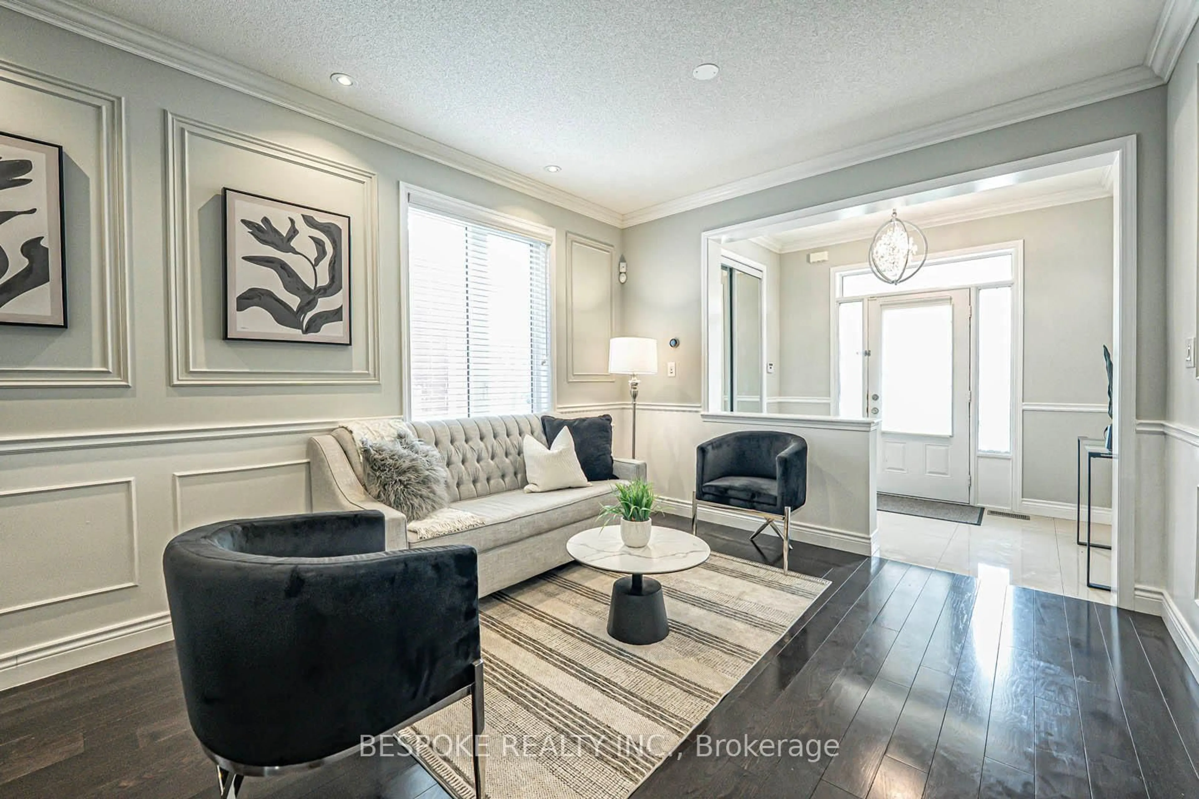 Living room with furniture, wood/laminate floor for 13 Miracle Tr, Brampton Ontario L7A 0Y3