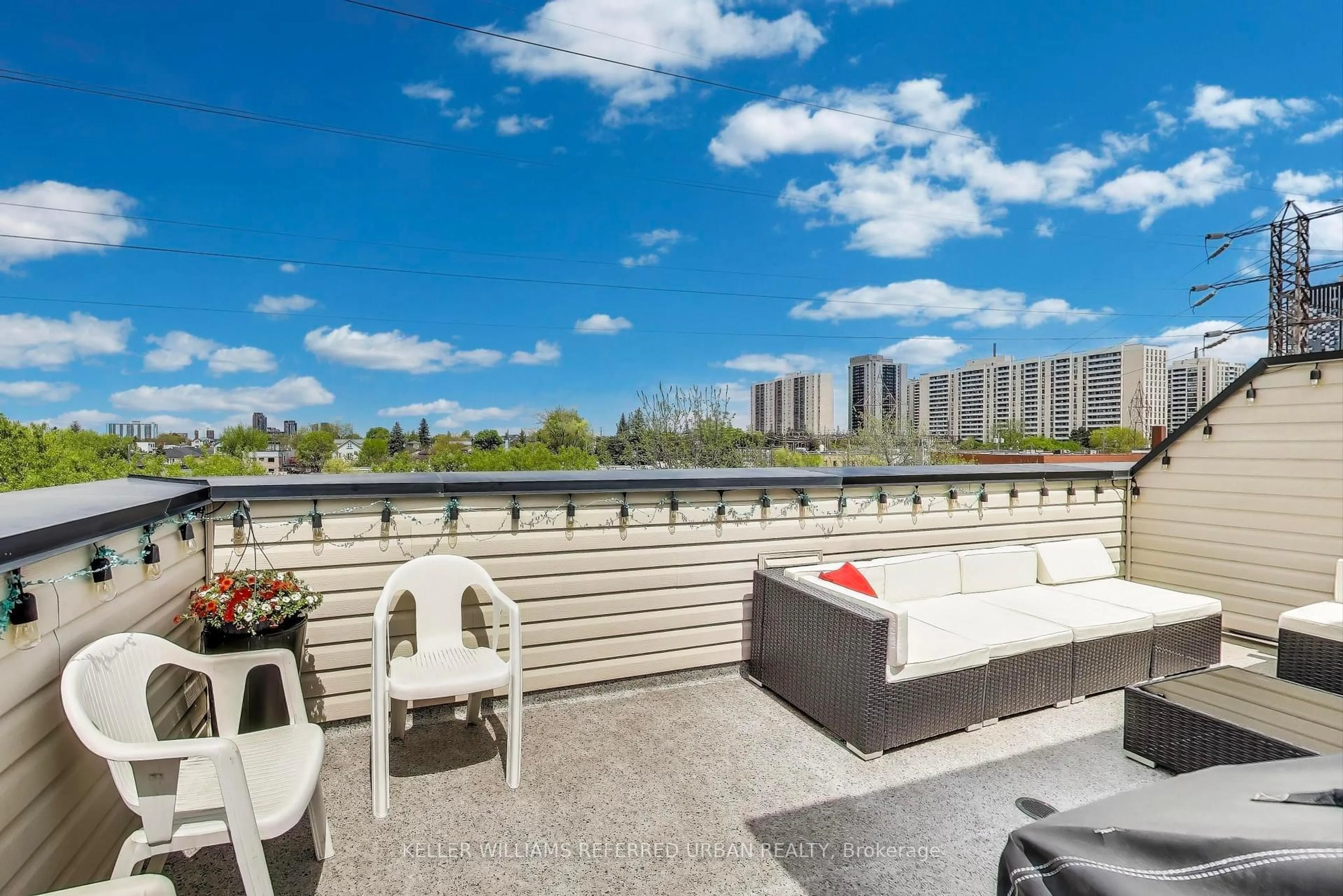 Patio, city buildings view from balcony for 380 Hopewell Ave #231, Toronto Ontario M6E 2S2