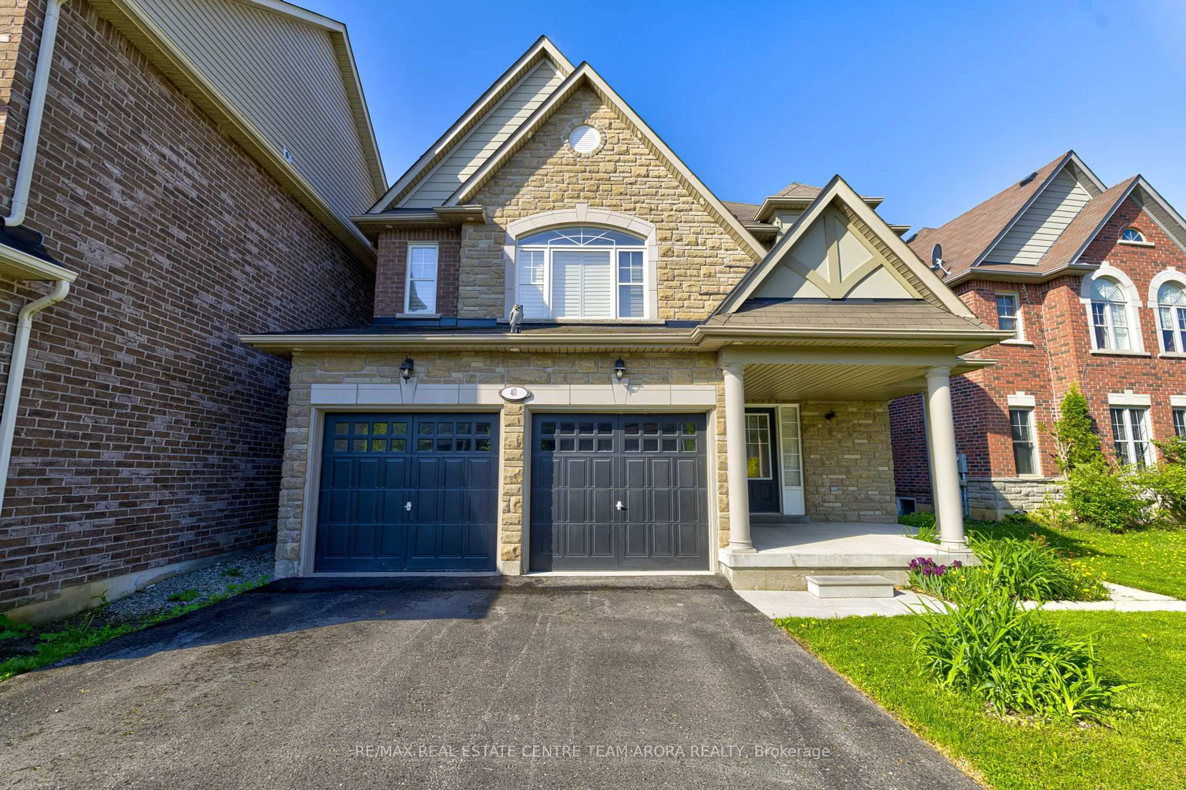 Home with brick exterior material, street for 40 Stephanie Ave, Brampton Ontario L6Y 0R8