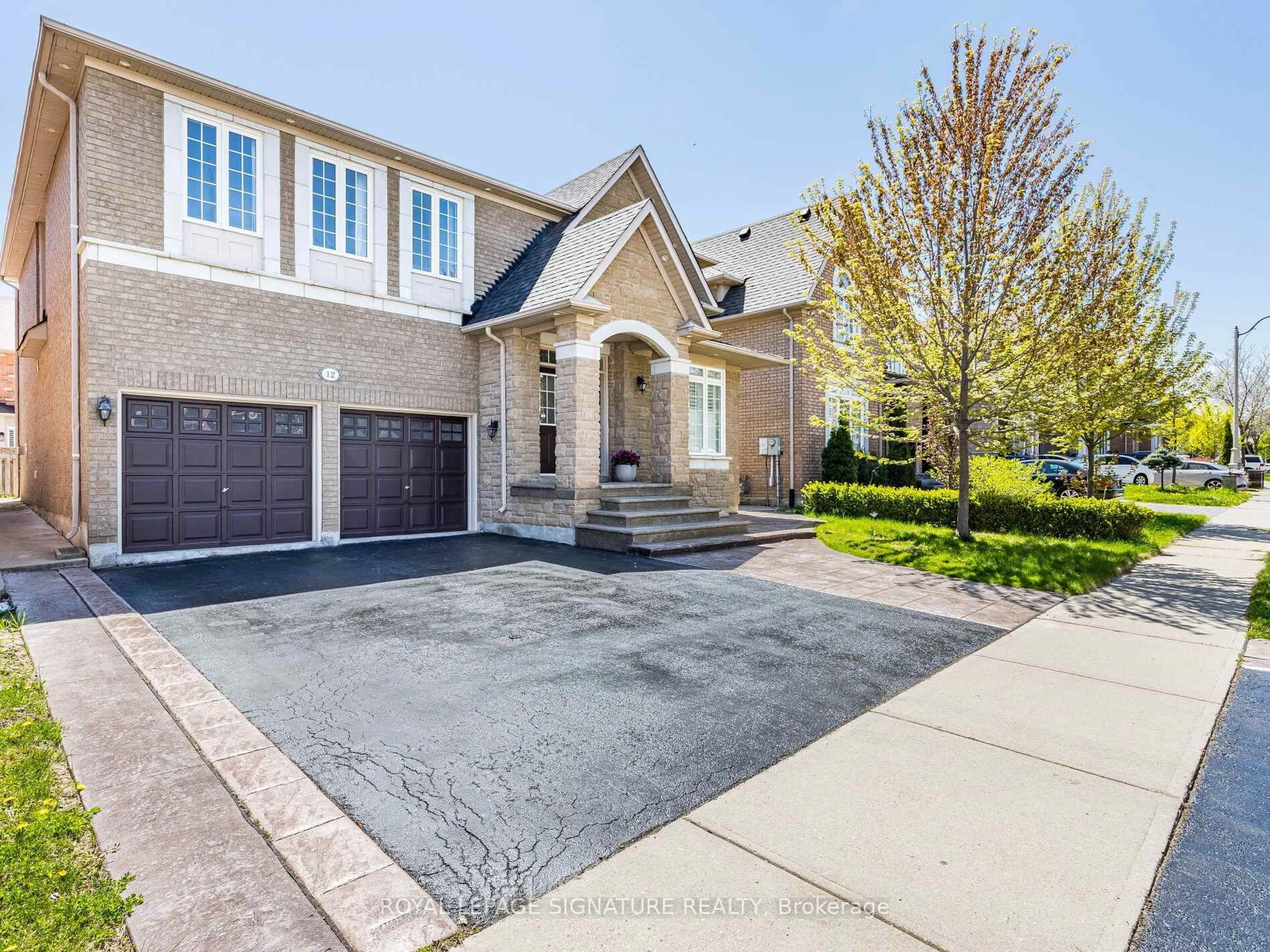 Home with brick exterior material, street for 12 Northface Cres, Brampton Ontario L6R 2X9