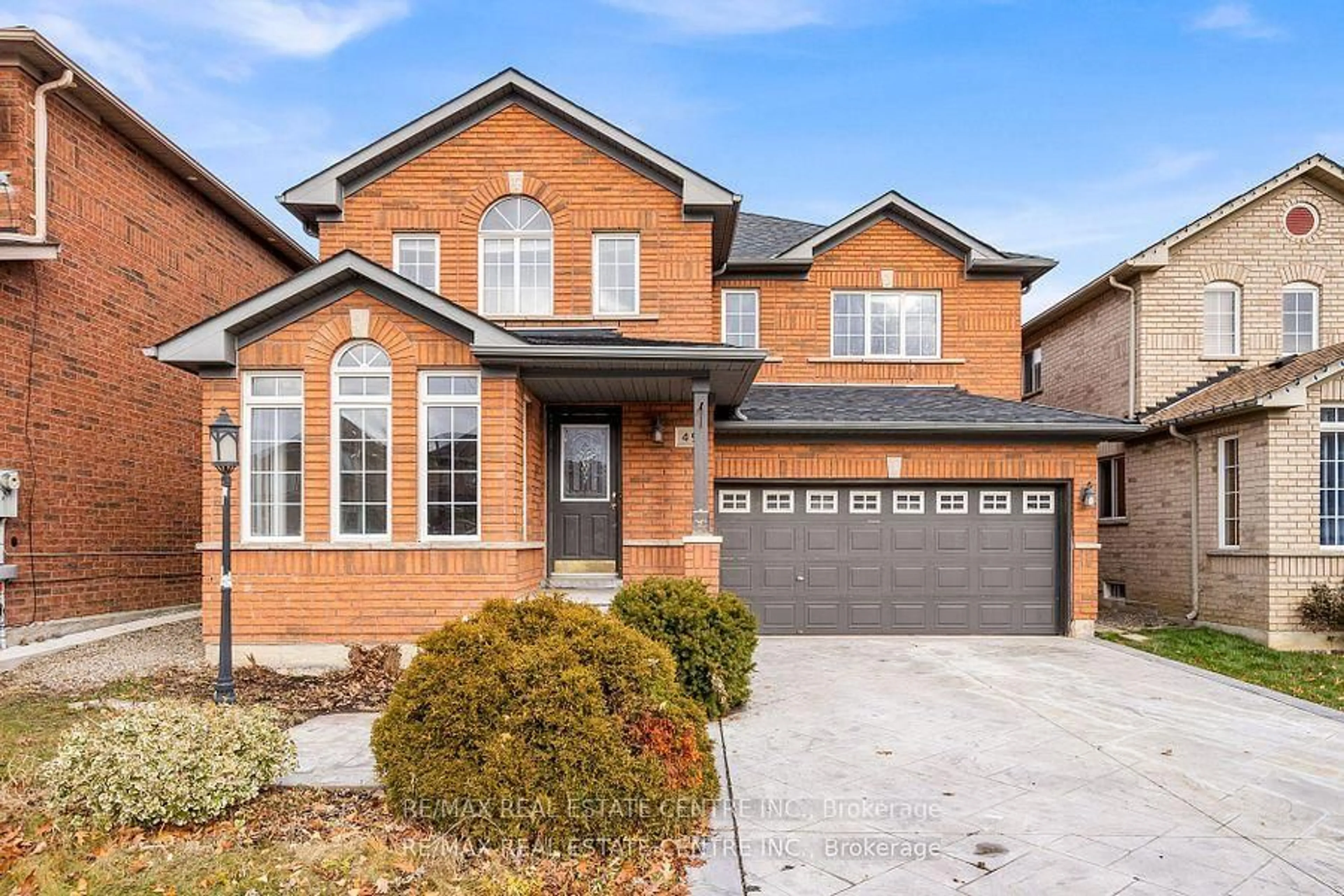 Home with brick exterior material, street for 49 Hollowgrove Blvd, Brampton Ontario L6P 1A9