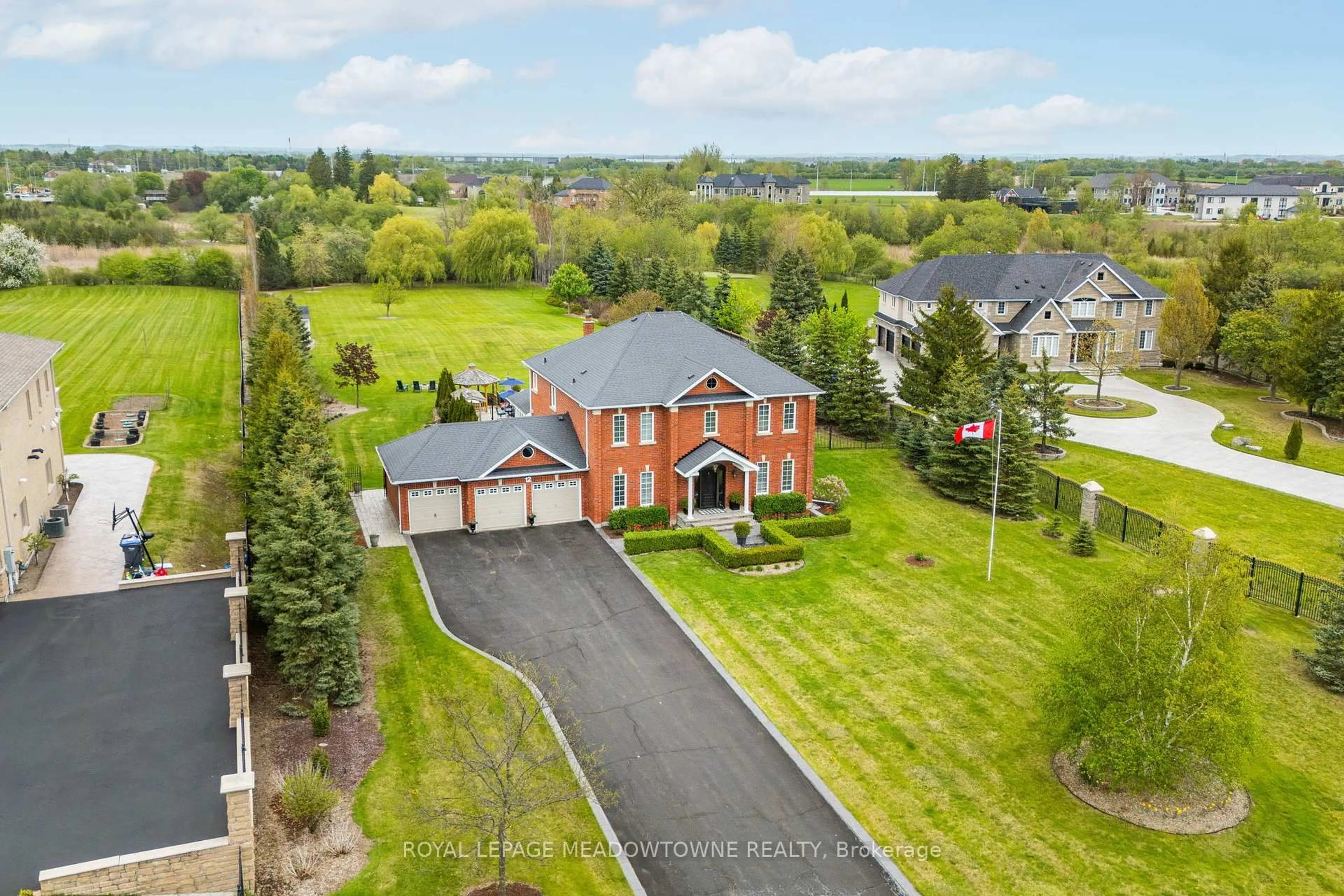 A pic from outside/outdoor area/front of a property/back of a property/a pic from drone, street for 12 Everglade Dr, Brampton Ontario L6P 0R2