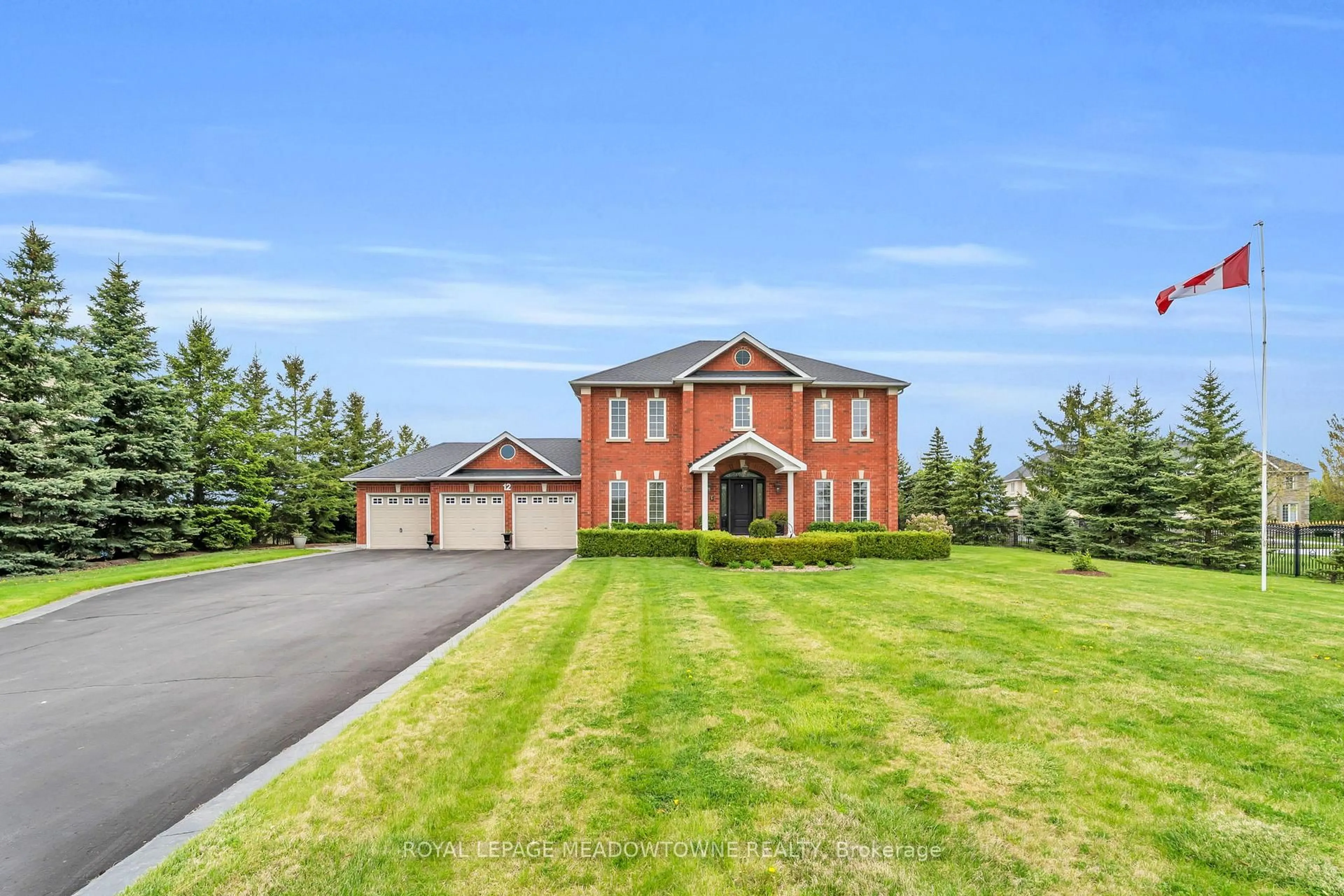 Home with brick exterior material, street for 12 Everglade Dr, Brampton Ontario L6P 0R2