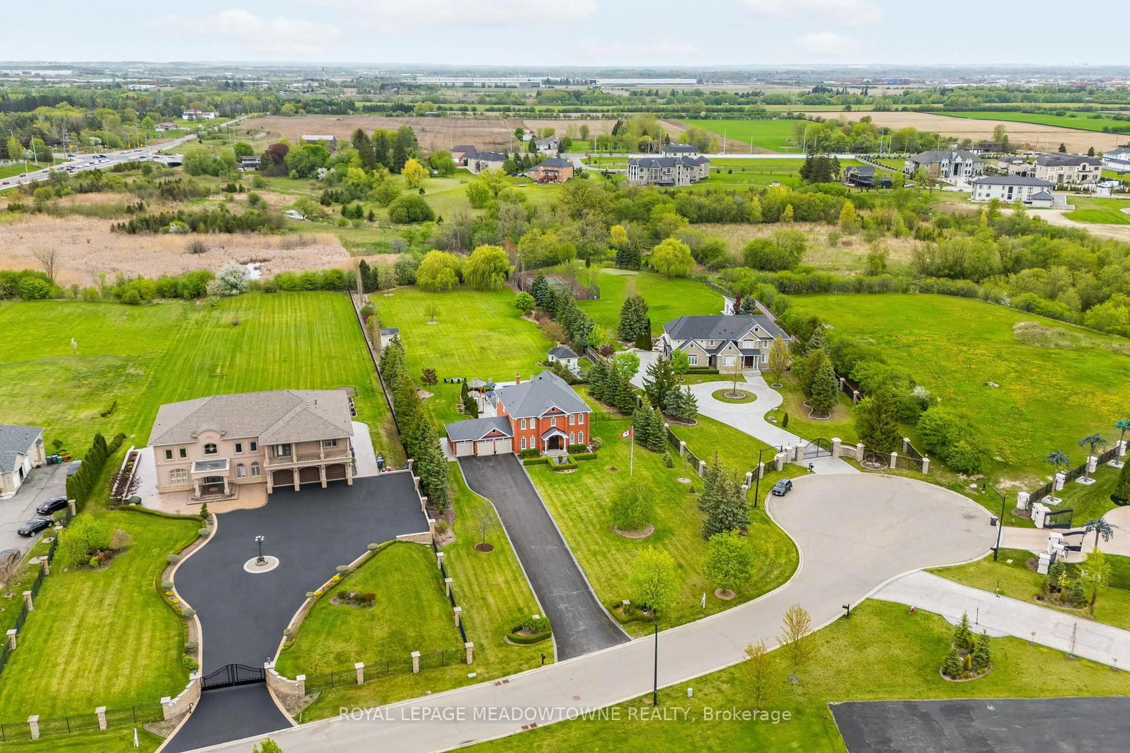 A pic from outside/outdoor area/front of a property/back of a property/a pic from drone, street for 12 Everglade Dr, Brampton Ontario L6P 0R2