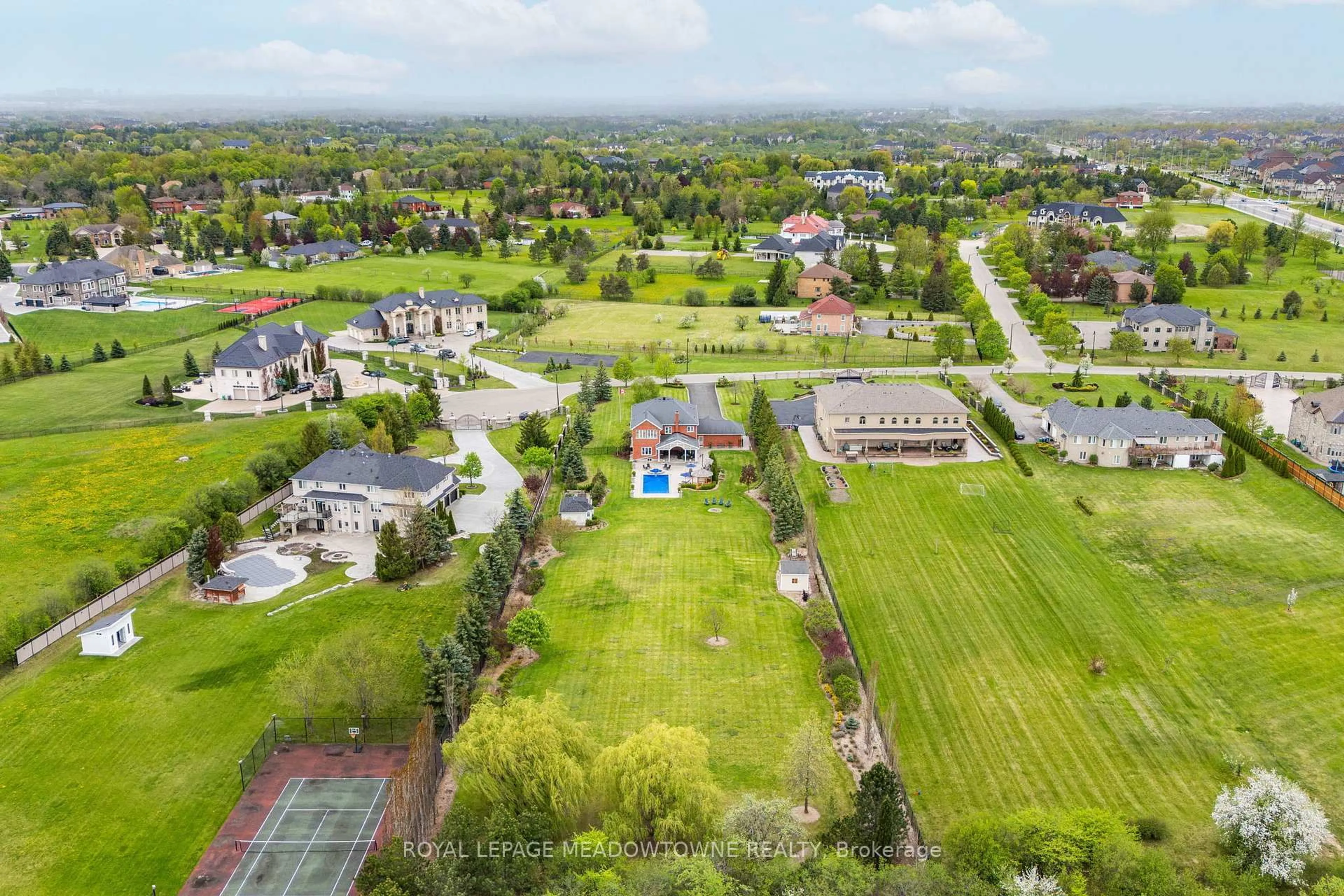 A pic from outside/outdoor area/front of a property/back of a property/a pic from drone, mountain view for 12 Everglade Dr, Brampton Ontario L6P 0R2