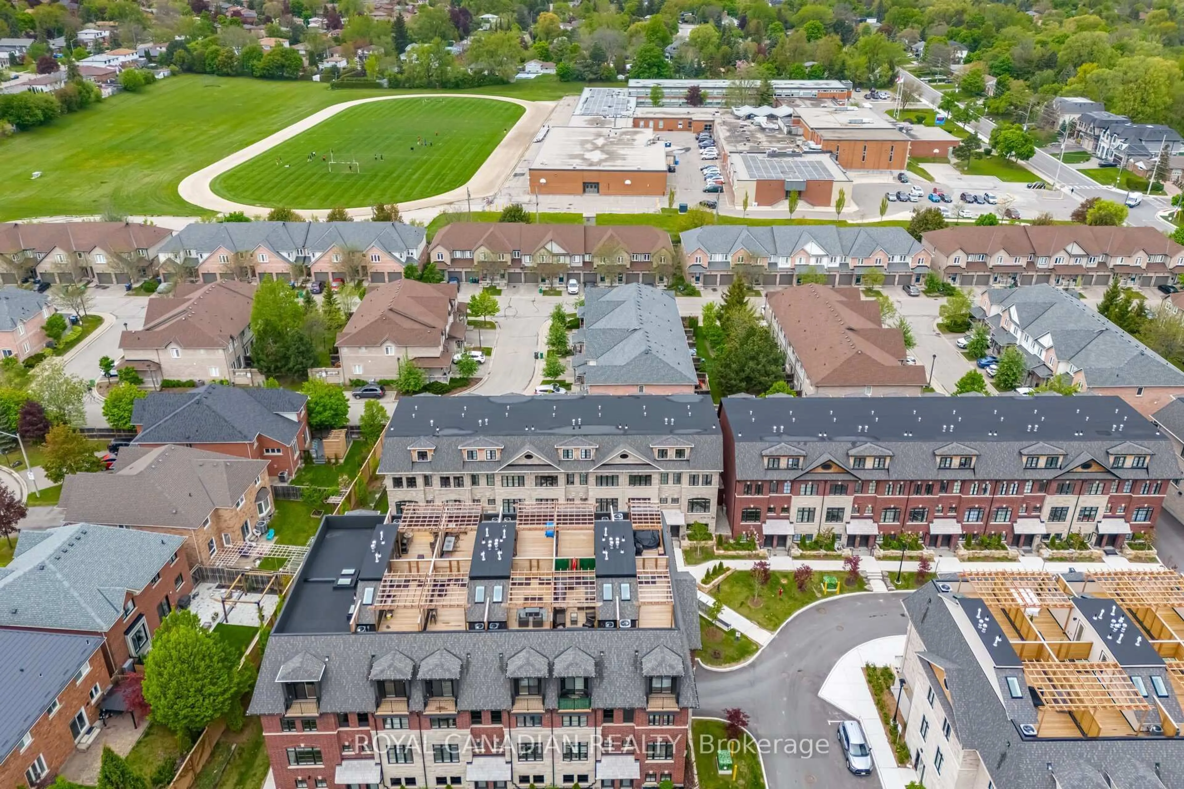 A pic from outside/outdoor area/front of a property/back of a property/a pic from drone, street for 50 Lunar Cres #156, Mississauga Ontario L5M 2R4