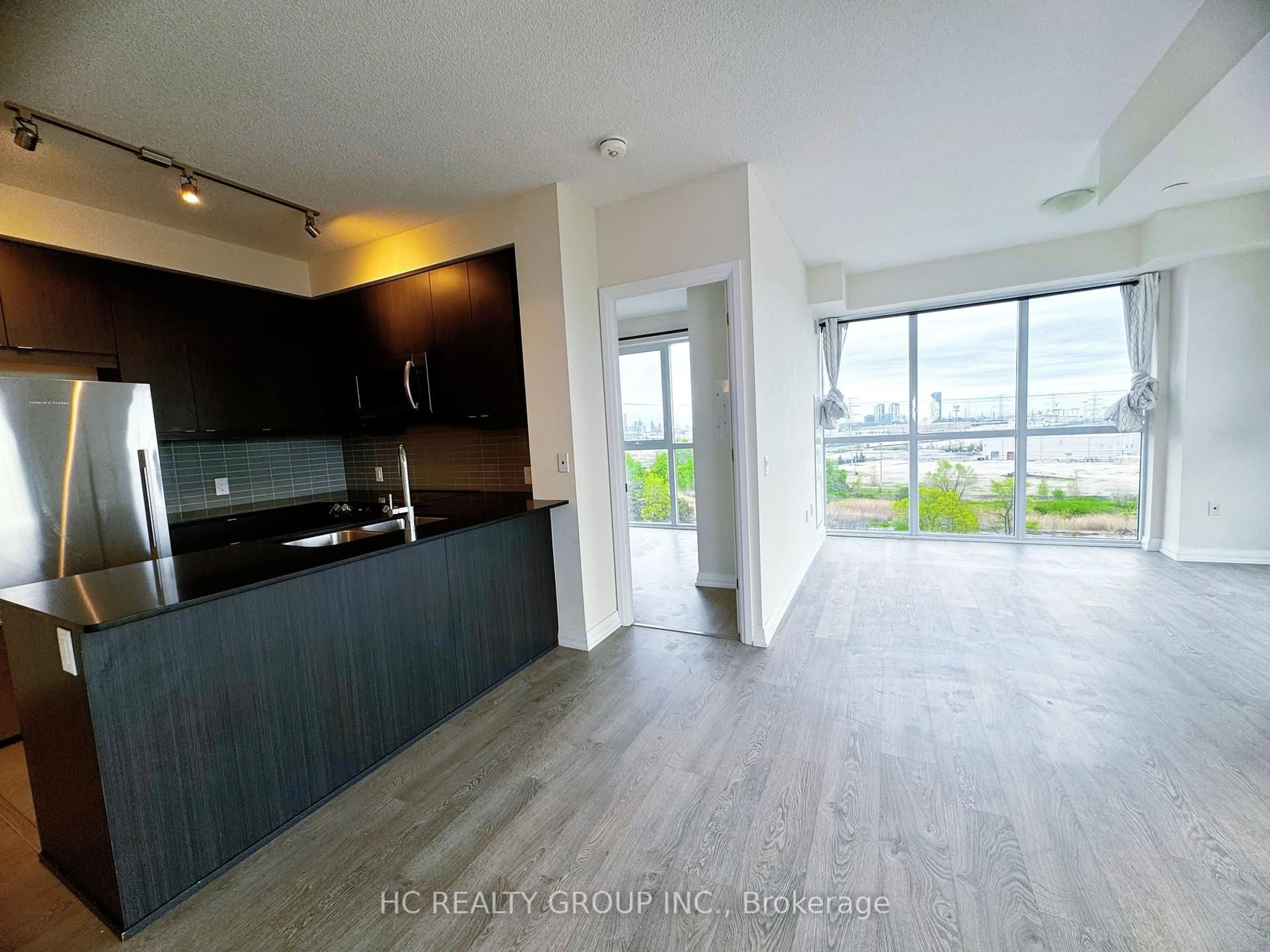 Open concept kitchen, unknown for 50 Thomas Riley Rd #504, Toronto Ontario M9B 0C5