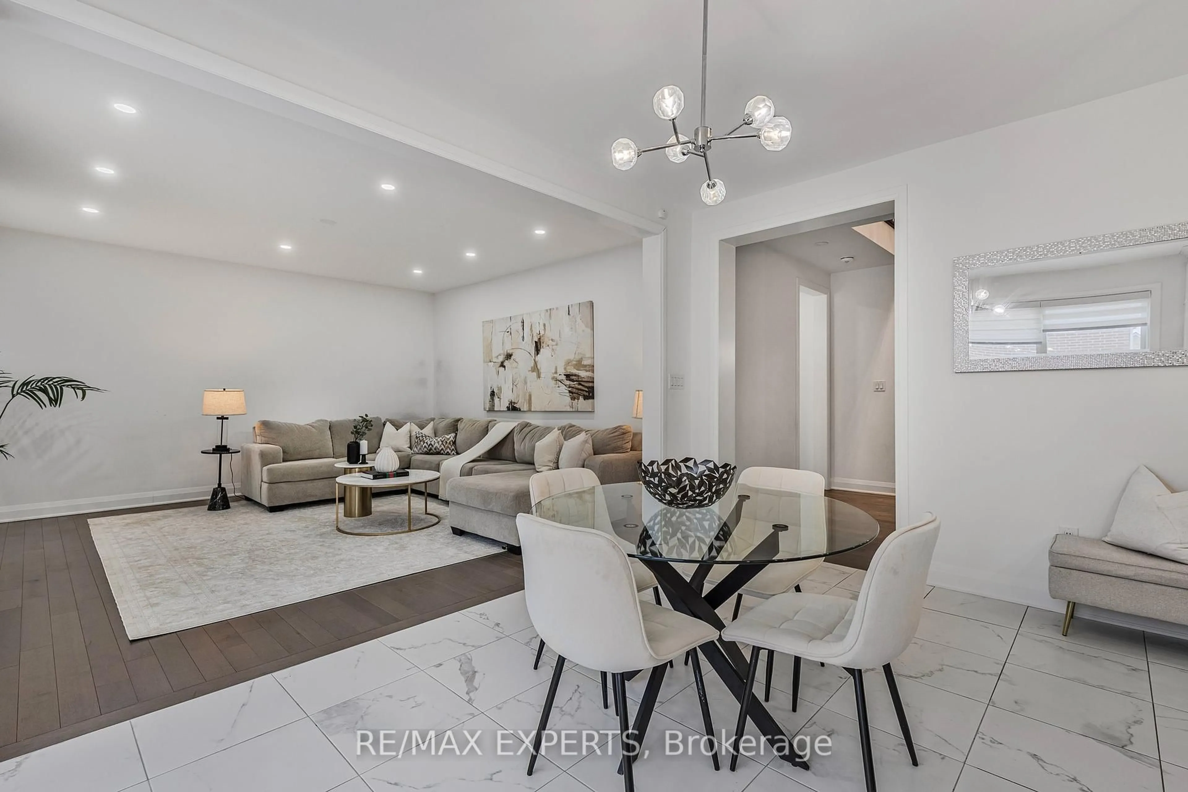 Living room with furniture, ceramic/tile floor for 1411 Lobelia Cres, Milton Ontario L9E 1X1