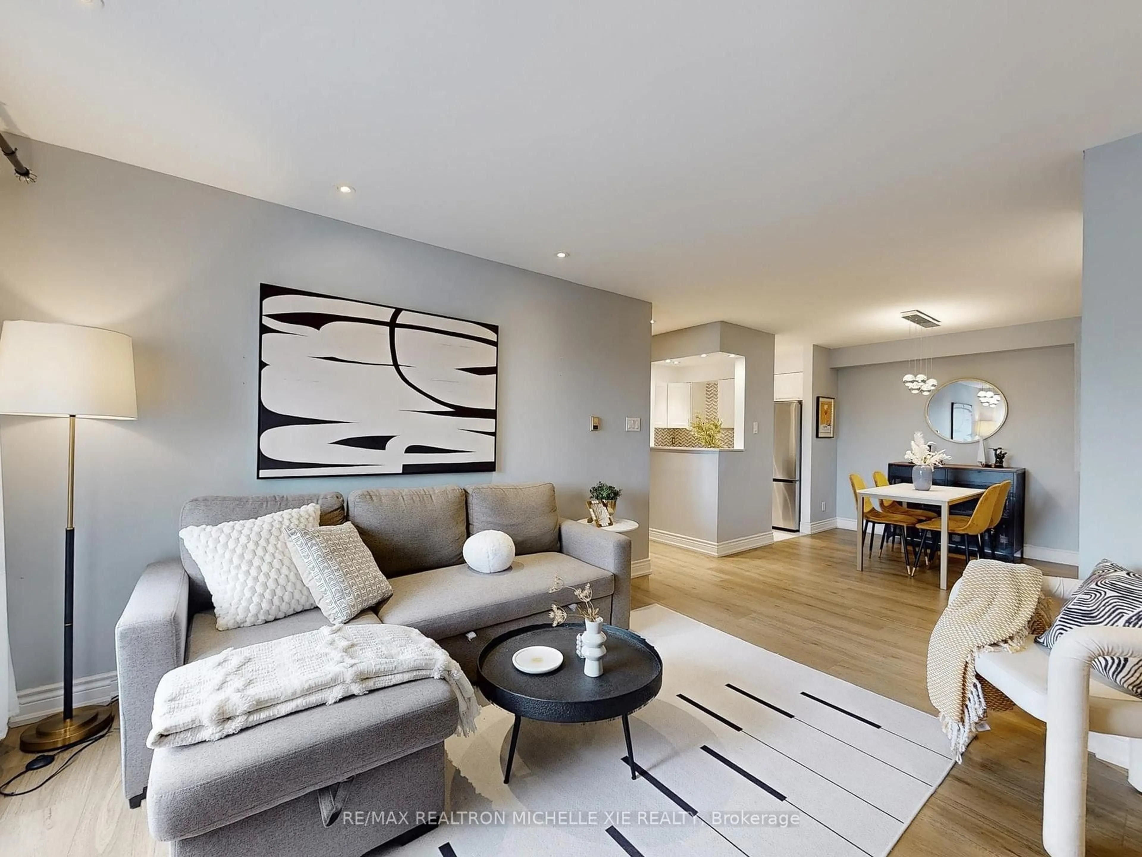 Living room with furniture, unknown for 65 Trailwood Dr #133, Mississauga Ontario L4Z 3L1
