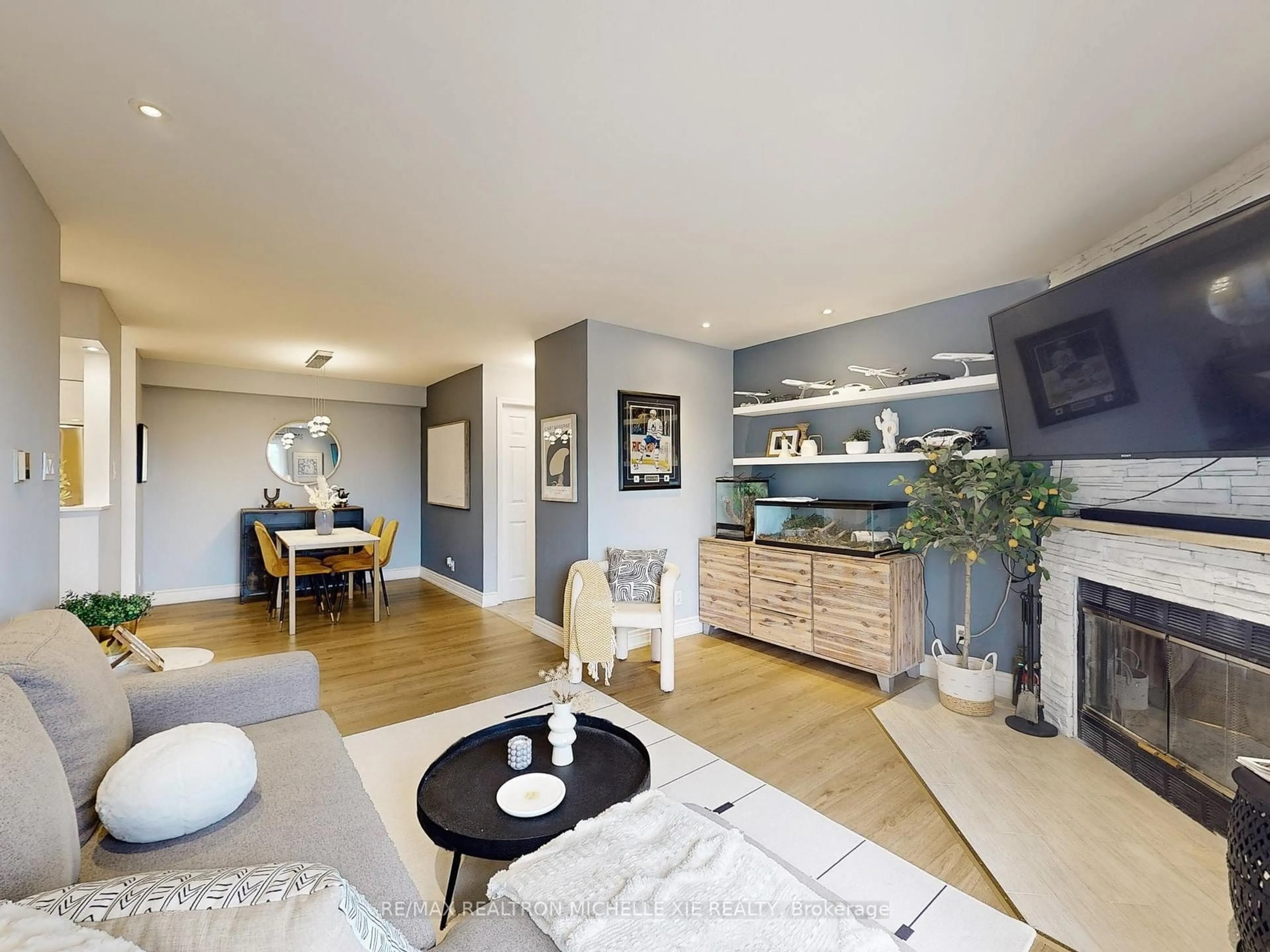 Living room with furniture, unknown for 65 Trailwood Dr #133, Mississauga Ontario L4Z 3L1