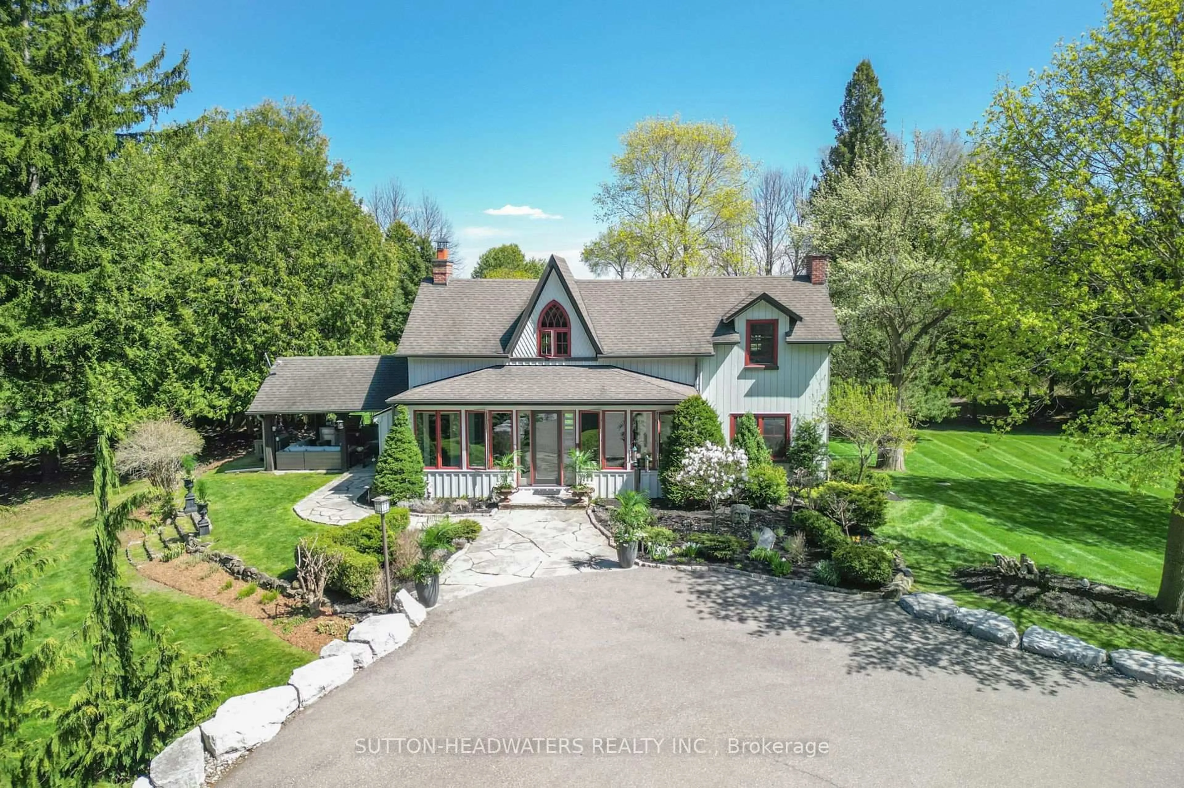 A pic from outside/outdoor area/front of a property/back of a property/a pic from drone, street for 4075 The Grange Sdrd, Caledon Ontario L7C 0G2